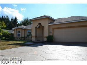 Spacious 3/2 waterfront single family house with PAID ASSESSMENTS and NEW ROOF. Property is located in residential neighborhood close to major roads, supermarkets and lots of other stores. Open floor plan, high ceilings, all tiled floors, stainless steel appliances, kitchen counter and breakfast bar with granite counter tops, ceiling fans in all rooms, screened-in and covered lanai, nice size yard towards the fresh water canal great for putting in a new pool. All 3 bedrooms have closets, separate laundry room, 2 car garage with automated door.