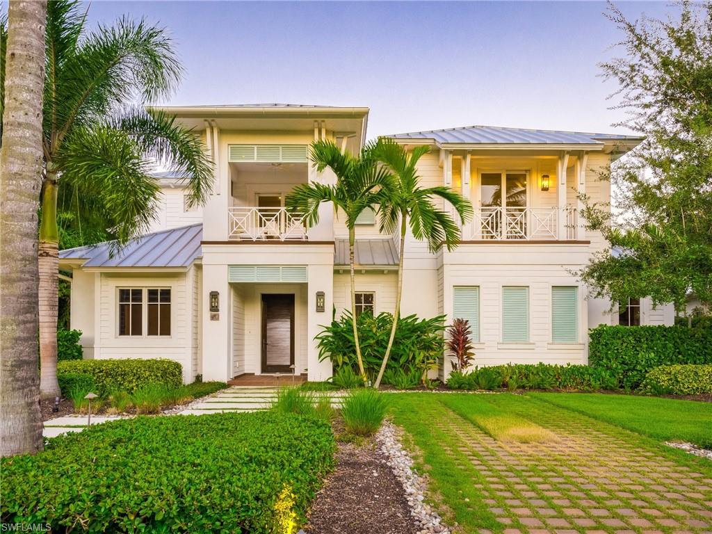 Lives Like New! This beautiful 3,994 Sq. Ft. under air (5,305 Sq. Ft. Total) home is located in the heart of Olde Naples just 2 blocks to the Beach and 5 Blocks to 5th Ave S. This home features Four Full Bedrooms with the Master on the First Floor, Den, Four Full Baths and 2 Half Baths. Entertaining is a breeze with the gorgeous salt water Pool and Spa with Southern Exposure and a Water Feature, a Pool Bath (acts as 2nd half bath) and Outdoor Kitchen. Wide Plank wood floors, built in closets, marble and quartz tops and amazing ceiling details are just some of the exquisite finishes. This outstanding residence is finished with a Full 2 Car Garage with 2 extra outdoor spaces off the side alley with Landscape lighting.