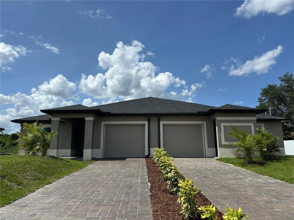 Beautiful Duplex, 6 bedrooms, 4 bath, 2 car garage, Sealed long driveway, modern kitchen with brand new stainless steel appliances, Quartz counter top. Impact windows, Paved Patio for BBQ. Close to Shopping area.  Moving ready. Don't miss it !!