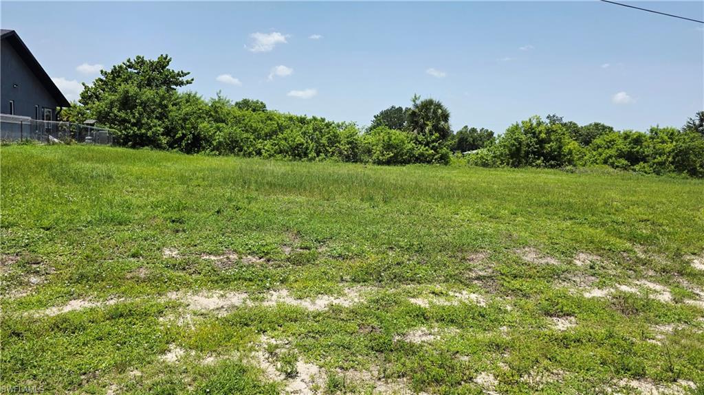 Build Your Dream Home! Excellent residential lot with canal located in the desirable and fast-growing Northeast Cape Coral area. Offering the ideal layout for a new construction home with space for a pool and outdoor living. Situated in a quiet, this lot is perfect for homeowners and investors alike. Conveniently located close to schools, shopping, dining, and with easy access to major roads, Don’t miss this great opportunity to invest or build in one of Cape Coral’s most rapidly growing area, Sewer And Water Available.