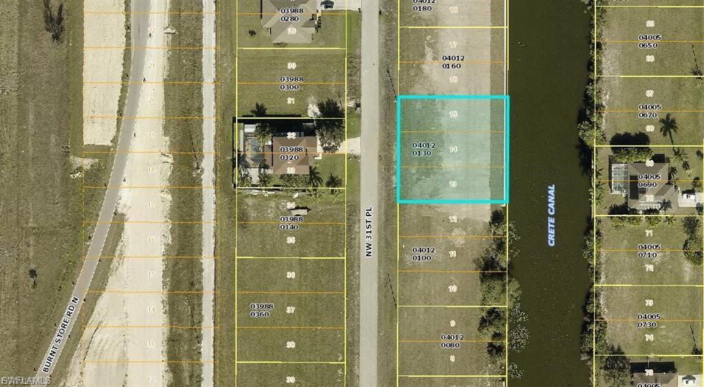 Skip the 18-Month Delay: Seawall Done, Blueprints Ready, Build Immediately on Crete Canal!
Why waste a year fighting marine contractors, paying skyrocketing engineering fees, and waiting on architects? This oversized triple-lot package (Lots 13-15) in the rapidly growing Northwest Cape is fully prepped to bypass the worst bottlenecks of the Southwest Florida building process. Positioned directly on the serene Crete Canal, this property is a turnkey development opportunity for an investor or an end-user demanding immediate execution.

The Capital Advantages:
Seawall Completed (2022): The heavy lifting is already done. A structurally sound, fully installed seawall means tens of thousands in capital already deployed and zero waiting on backlogged marine installation queues.

Ready Blueprints available: Move straight to the city desk.  Complete architectural plans for a high-demand, modern, energy-efficient 3-Bedroom, 3-Bathroom, 3-Car Garage (3/3/3) footprint designed perfectly for this specific site layout.
Oversized Triple-Lot Footprint: Maximum design flexibility, superior privacy, and ample room for an expansive custom pool deck and outdoor kitchen configuration.
Prime Northwest Location: Situated just off the Burnt Store Road corridor, offering rapid logistical access to both local amenities and regional transit routes.
Stop looking at raw dirt that will take two years to realize. Secure a site where the timeline has already been compressed for you.