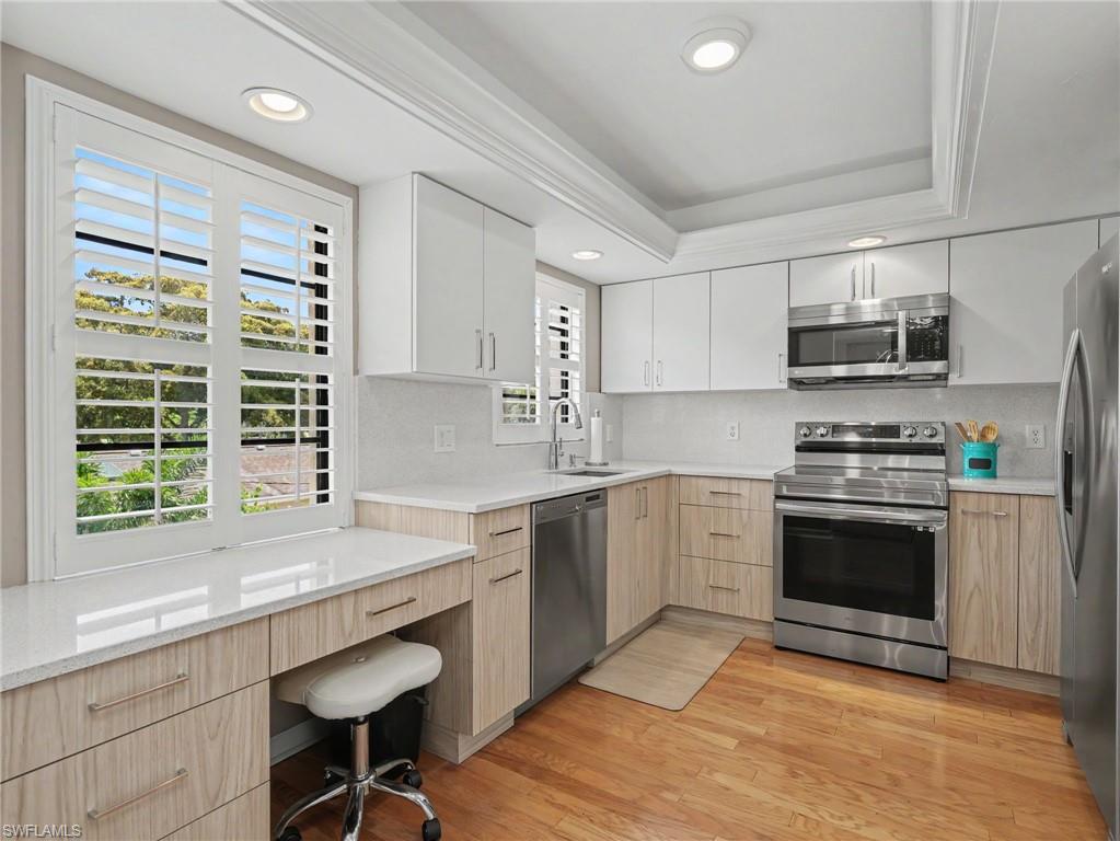 Opportunities like this don't come along often — and the numbers back it up. There are simply no other 2-bedroom, 2-bathroom condos in Olde Naples with comparable finishes/features and access to a private community pool available under $1.6 million. This is your chance to own a piece of one of Naples' most coveted neighborhoods at an exceptional value.
Nestled in the heart of Olde Naples, this beautifully updated condo puts you steps away from world-class dining, boutique shopping along Third Street South and 5th Avenue South, and the sugar-white sands of the Gulf — all with one of the area's highest walkability scores. Leave the car behind and embrace the Naples lifestyle you've been dreaming of. This home is just a short walk to the Gulf beaches. 
Inside, the attention to detail is immediately apparent. Oak wood and Marble floors flow throughout, while plantation shutters on every window add a classic coastal elegance. The kitchen was fully reimagined in 2022, featuring quartz countertops that extend seamlessly all the way up as the backsplash — a designer touch rarely seen at this price point. Fresh paint from 2022 keeps the entire space feeling bright and inviting.
The major systems are equally impressive: a 4-year-old AC unit and a roof replaced just 5–6 years ago mean you can move in with complete confidence and zero short-term concerns. Pet friendly policy! Negotiable furnishings, stylish design, and unmatched in value,  — this Olde Naples gem won't last.