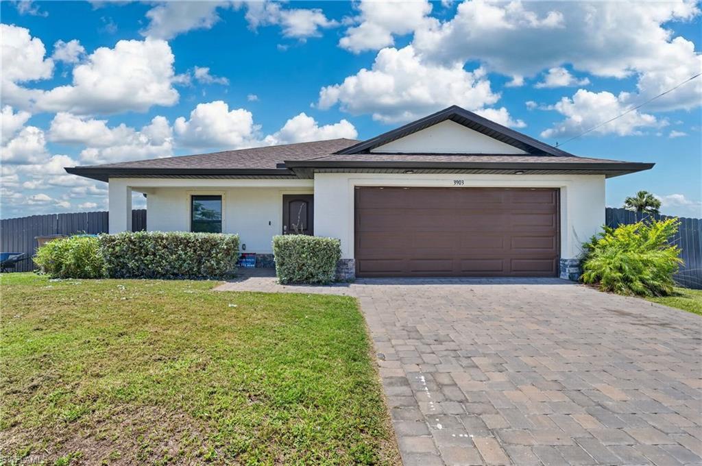 2022-built home, ideally situated in fast growing Northwest Cape Coral. Tucked away in a quiet, peaceful setting, this property offers the perfect balance of privacy and convenience, just minutes from the shopping, dining, and entertainment along the Pine Island Road corridor.

Positioned near parks, boating access, and the exciting future 7 Islands Gulf Gateway Resort & Marina Village, this home is ideally located to enjoy both today’s amenities and tomorrow’s growth. With no HOA.

Inside, the thoughtfully designed split-bedroom floor plan provides comfort and privacy, while the long entry hallway opens into a spacious great room where the living, dining, and kitchen areas seamlessly come together. Matching tile flooring throughout, recessed lighting, and a neutral color palette create a bright, modern feel.

The spacious primary suite features custom built-in closet organizers and a well-appointed en-suite bath with dual vanities. Additional highlights include an indoor laundry room and a screened under-truss lanai overlooking the fully fenced backyard, providing plenty of room to add your dream pool and create your own private outdoor oasis.

Whether you’re searching for a full-time residence, seasonal retreat, or investment opportunity, this move-in-ready home delivers modern construction, desirable features, and an exceptional location in one of Cape Coral’s most promising areas.