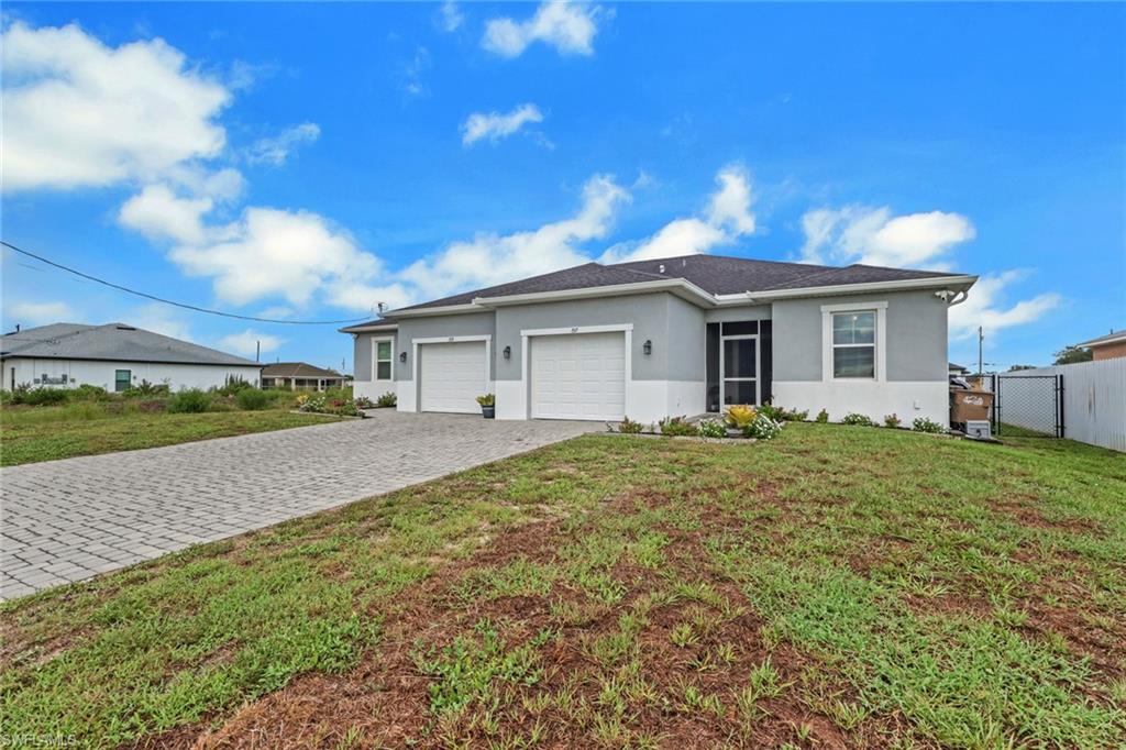 Rare Opportunity! These custom-built attached villas are being offered for sale simultaneously and must close together—either to one buyer purchasing both homes or to two buyers purchasing at the same time. Unlike a traditional duplex, each residence is individually parceled and can be financed with its own mortgage, allowing each owner to enjoy the privacy and independence of homeownership while living next door to family or close friends.

Welcome to 1517 NE 8th Place, Cape Coral, where quality craftsmanship, thoughtful upgrades, and waterfront living come together at an incredible value. Built in 2020, this beautifully appointed 3-bedroom, 2-bath attached villa offers the luxury and feel of a custom home with the affordability and convenience of low-maintenance living.

From the moment you arrive, you'll appreciate the inviting screened front porch, paver driveway, and exceptional curb appeal. Inside, soaring 10-foot ceilings, elegant crown molding, granite countertops, and tile flooring throughout create a bright, open living space designed for both comfort and style.

The spacious kitchen flows seamlessly into the living room, where impressive three-panel sliding glass doors open to an extended screened lanai overlooking a peaceful freshwater canal. Step outside to enjoy your morning coffee, entertain friends, or simply relax while taking in the waterfront views. A shared concrete dock provides direct access to the freshwater canal, making it easy to kayak, fish, or enjoy Southwest Florida's outdoor lifestyle.

The spacious primary suite features dual vanities, a luxurious floor-to-ceiling tiled walk-in shower, and a large walk-in closet. The spare bathroom features a jacuzzi tub for cozy relaxation after a long day. An oversized one-car garage provides additional storage, while the fully fenced backyard offers privacy for pets and outdoor entertaining. Best of all, this home is not located in a flood zone, providing added peace of mind and potential insurance savings.

Originally custom built by the current owners so they could enjoy luxury living side by side, both villas feature the same thoughtfully designed floor plan and identical high-end finishes. Whether you're looking to purchase both homes for investment or multi-generational living, or you're coordinating with parents, adult children, siblings, or close friends, this is a truly unique opportunity. Each residence can be owned, financed, and mortgaged separately, allowing every owner to enjoy the benefits of independent homeownership while living next door to the people who matter most.

Luxury finishes. Waterfront living. No flood zone. Individual ownership. A one-of-a-kind opportunity—all for just $259,999.
