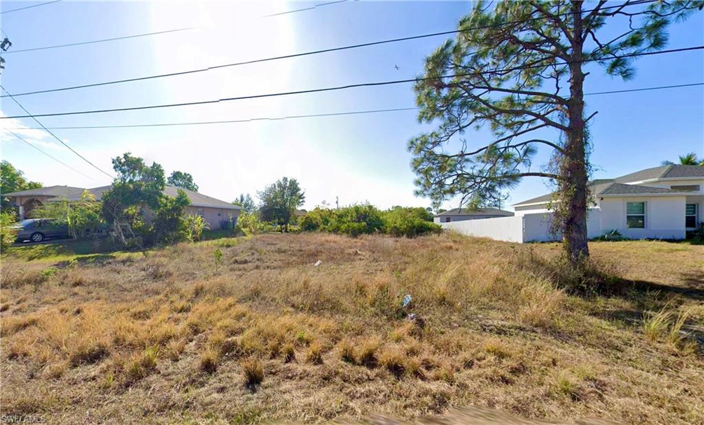 What a fantastic opportunity to purchase a great oversized lot in the booming SW area of Lehigh! Electric pole right out front for easy connection. Naturally mostly clear and has no large trees to remove! It would be perfect to build that pool home you always dreamed about and soak up the sun rays with the Southern rear exposure! Located with quick access to Fort Myers via SR-82, just minutes from Wal-Mart, restaurants, schools and much more! Call today to snatch this up before someone else does! Seller also has another lot located in the SW right up the street, put together a package deal.