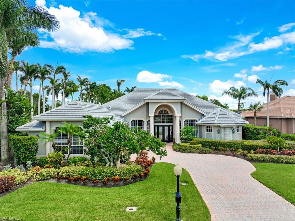 Discover your new Gulf Harbour lifestyle as soon as you walk through the doors of this classically styled and completely updated home. This is an entertainers dream home...your guests come together in this open floor plan combining a large living room with fireplace and a cozy dining room for hosting intimate dinners with close friends. Large gourmet kitchen with island and wet bar leads into a massive family room making this the main gathering spots of the home. Want to bring the indoors out, glass sliders open onto a beautiful lanai where you can sit around the pool and enjoy drinks with friends and family until the sun goes down. The master bedroom in an owners dream room. Here you find another fireplace with built in television making this a great place to relax after a long day. All marble master bath with free-standing tub, open shower with body sprays and ceiling mount shower head gives a true spa like experience. Too many upgrades to list but the detail and styling will be seen during your private showing of this home. Gulf Harbour provides its residence the ultimate lifestyle, this home will enhance that lifestyle.