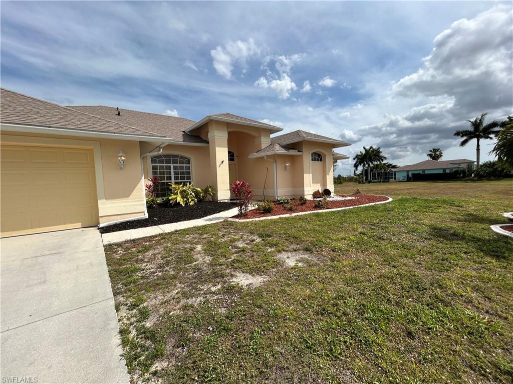Welcome to this stunning home in Cape Coral, FL, boasting 3 bedrooms and 2 bathrooms. This gorgeous home features tile flooring in the main rooms and plush carpeting in the bedrooms for added comfort. The master bathroom includes a luxurious soaking tub, perfect for unwinding after a long day. Step outside to the oversize lanai and take in the relaxing view of the serene lake. With plenty of storage space throughout, this home offers both style and functionality. Don't miss out on the opportunity to make this beautiful house your new home. Non aggressive breed dog considered with non refundable fees
