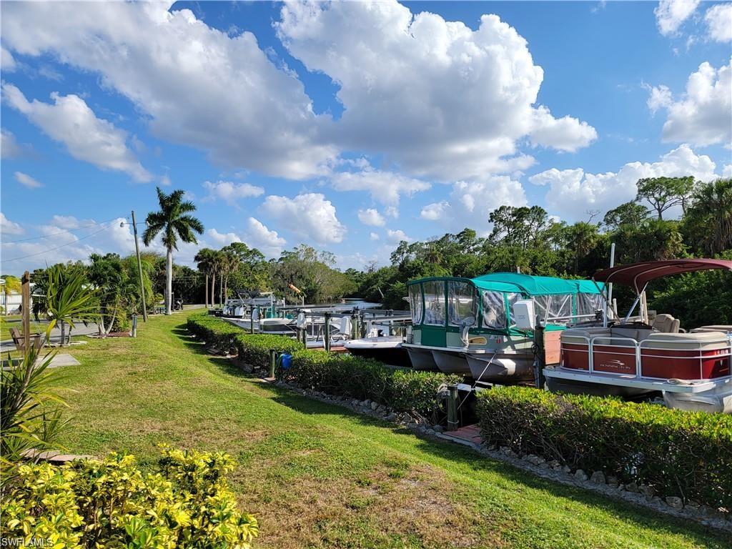 Bring your water toys!  You own the land. What a great location for a winter getaway or year round home.  This 55+ boating community is located on the scenic Estero River.  Gulf access via the Estero River.  This lot is cleared and ready for your new home.  Mariner's Cove has a community pool, clubhouse, and Estero River access.  Residents enjoy the boat ramp, docks with lifts, (available via waitlist), and access to the Gulf.  The community pool has a river view, the clubhouse hosts social events, you have shuffleboard, pickleball, library, and a low HOA of $131 a month!  Mariner's Cove is conveniently located off US 41, 20 minutes to RSW International Airport, beaches,
Miramar shopping, and some of the best dining in Southwest Florida.  Come see what this hidden gem has to offer.