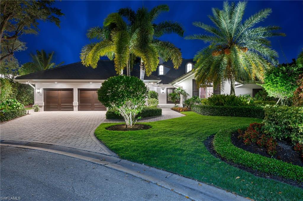 Welcome to your dream one-story lakefront pool home with over 180 linear feet of pristine lakefront, located on a prestigious street in the Pelican Bay community of Naples, Florida. Extensively renovated by Martin Custom Homes in 2013, this luxurious residence offers modern conveniences and a prime location. Spanning 5,478 square feet under air and 6,744 square feet under roof, this spacious home sits on a 0.46-acre lot at the end of a quiet cul-de-sac with north western rear exposure. It features 4 bedrooms and 5.5 bathrooms, including 3 private guest suites with attached bathrooms for added privacy. The master suite boasts a large bedroom with a seating area and sliding glass doors to the pool deck, showcasing breathtaking lake views, a vaulted ceiling, and a massive walk-in closet. The luxurious master bathroom includes dual vanities, a free-standing soaking tub, and a sizable walk-in shower. The updated eat-in kitchen is a chef's dream with 2 center islands topped with quartz countertops and high-end appliances, including a Wolf gas range and Sub-Zero refrigerator. Beautiful vaulted and tray ceilings enhance the open-concept layout that flows from the great room to the kitchen and family room. The serene pool overlooks the lake, while the covered outdoor living area features a summer kitchen and full bathroom. Recent updates include a new roof (2021), HVAC units (2021-2022), and water heaters (2023). The home is protected by impact-rated windows and doors. Expertly maintained, it showcases dark wood flooring in main living areas, new carpeting in bedrooms, and tile in laundry and bathrooms. Pelican Bay offers an exceptional lifestyle with nearly 3 miles of private white sand beaches, beachfront dining options like Marker 36 restaurant, and abundant recreational opportunities across its 570 acres of mangroves and estuaries. Residents enjoy 18 Har-Tru tennis courts (with pickleball courts coming soon), parks, walking trails, sailing, and kayaking through scenic waterways. This exquisite property on a quiet street in Pelican Bay is the ultimate sanctuary for those seeking elegance, comfort, and convenience in this premier community.