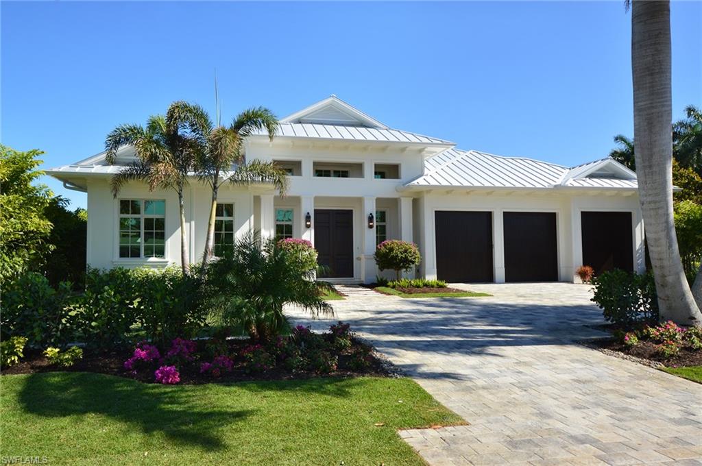 One of the Moorings most exquisite  homes with over 4,200 sq ft of one story living space and endless golf course views is currently under construction by Knauf-Koenig Group.  One of the best views of any home in the Moorings / Coquina Sands area. Impeccable detailing and architectural elements designed by Falcon Design. Soothing pallet of neutral shades including Legno Bastone wide plank wood flooring as well as wood beamed ceilings and architectural details provide a one of a kind living experience. Five bedrooms, all en suite with generous closets and baths. The master bedroom boasts a spacious bath and dressing room and opens to a beautiful view of the pool and golf course. The kitchen includes Ruffino Cabinetry Signature Collections Cabinetry,  Viking and  Subzero appliances and a walk in pantry. Generous great room floor plan with built in entertainment center and dining area with beverage bar allow for plenty of room for family living and entertaining. Outdoor living space includes: gas heated saltwater pool and spa, separate outdoor kitchen, a loggia area with a fireplace, all protected by roll screens and shutters.  Home is scheduled to be completed March 2017.