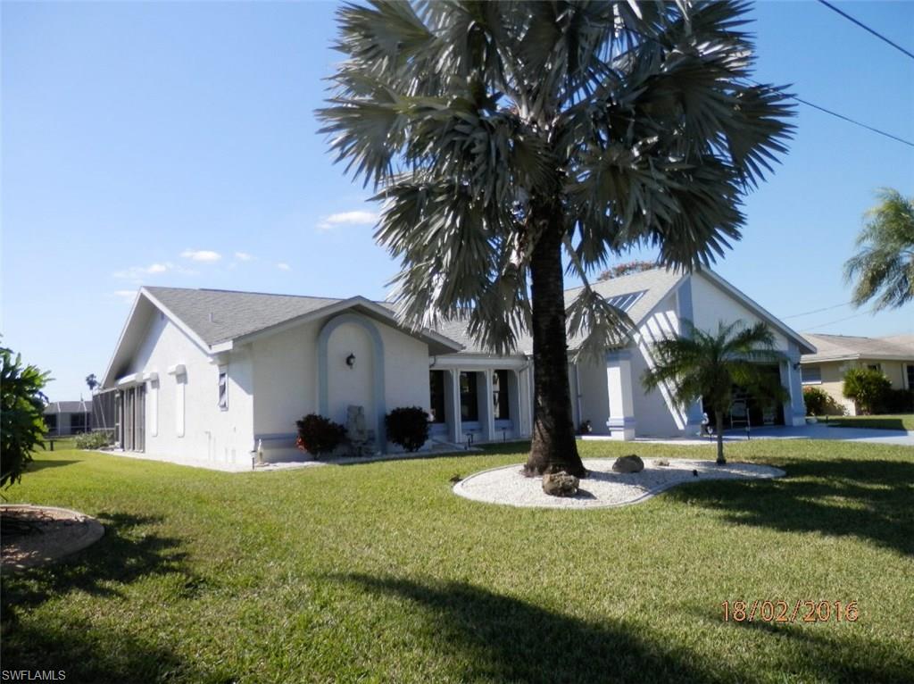 Lovely and charming well cared for gulf access POOL home. This home shows pride of ownership & comes fully furnished in excellent condition. (See confidential comments & information). Electric shutters in the patio area & roll shutters on all windows make the home perfect as vacation home/vacation rentals. It has a formal living room & dining room plus family room with dining area. The whole house is recently tiled with very nice larger tiles set on diagonal, except the 2nd bedroom. This COULD be your turnkey home ready to move in. Located just off the Rubicon Canal. Only 15 minutes to the river & one bridge! Home features 3 bedrooms, 2 full baths, boat dock, 7,000 lbs boat lift, 2-car garage with 2091 SqFt under air. The well-maintained pool is solar heated. This inviting home has a sunny open floor plan with SW exposure. Perfect in desired boater’s neighborhood & close to shopping & restaurants & seasonal farmers market. The house was re-piped in 2001. The house has an L shape floor plan. Granite kitchen counter & Florida style furniture. The master bathroom has extra mirrors that makes it inviting. This home provides real Florida feeling. Property is a must see & shows very well