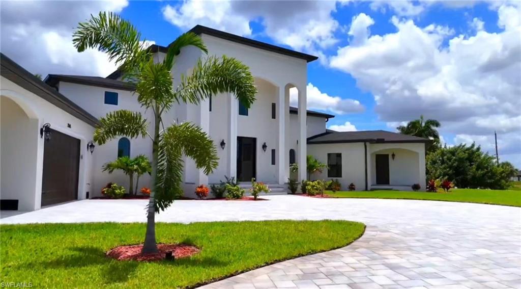 Sailboat Direct Gulf Access, No Bridges! 2024 Construction 5 Bed 4 Bath Pool Home on an oversized 16,300 sf lot. BAC-New construction w/newer seawall luxury Villa has 3,723 sf under air and 6,945 sf of indoor/outdoor space on the scenic Meadowview Lake. Upon entering the custom wrought Iron double entry door you are greeted by soaring ceilings and a very large formal great room with incredible views of the pool and lake beyond.The swimming pool Includes a pebble tech interior finish and auto filler.This home features 5bdrms,4baths with an outdoor hot/cold shower near the pool.One of the main-level bedrooms opens directly out to the swimming pool and is en-suite with a private bathroom including a enclosed water closet,separate soaker tub and large shower. The larger 800 sq ft  primary master bedroom suite is on the second floor. It has three large walk in closets, a balcony with water views of the lake, a sitting area, and spa-style bath with deep soaker tub. It also boasts a large separate enclosed shower with flush ceiling mounted rainfall/waterfall and body jets, marble top dual sink vanity and a separate water closet. The structure has a pre designed future elevator location.Bedroom 5 has a exterior entry that can be used as office or gym.The chef’s kitchen is separate from the living rm, with venting windows over the sink and includes a 36 inch six-burner gas cooktop (propane service available),custom solid wood,non veneer cabinetry, solid natural granite countertops, ss appliances, wine fridge,wet bar and a large walk in pantry closet.The kitchen is open to a formal dining rm and a large traditional keeping room for gatherings with a half bath that also functions as a convenient pool bath with outdoor shower. The laundry room also has a convenient exterior door out to the side yard. The wall mounted tankless water heater allows for unlimited instant hot water and even more parking space in the garage. All windows and doors are impact-resistant.The air conditioning system is an efficient "Rheem",three separate zone HVAC system. A new construction elevation certificate at 9.2 ft above base elevation is available upon request. The home is insured, high and dry never damaged and still brand new.The beautiful Meadowview Lake ensures privacy and provides premium views for miles.Located in the up and coming area west of Old Burnt Store Rd, NW Cape Coral,this property features Gulf Access with no bridges directly on the spreader canal to the now approved 7 Islands waterfront dining.When traveling by boat to the gulf, minimal wake is allowed all the way out with NO Bridges!. Not the 5mph no wake zone behind bridges with tidal wait times. Just get in and go! 40 min Matlacha pass and the Key Ditch Two Pines channel exit to Charlotte Harbor at Jacaranda Pkwy W is twent min.The barrier islands & mangroves provide proven storm protection in the NW compared to other parts of Cape Coral. 30ft Dock design and plan in place and ready to build.
