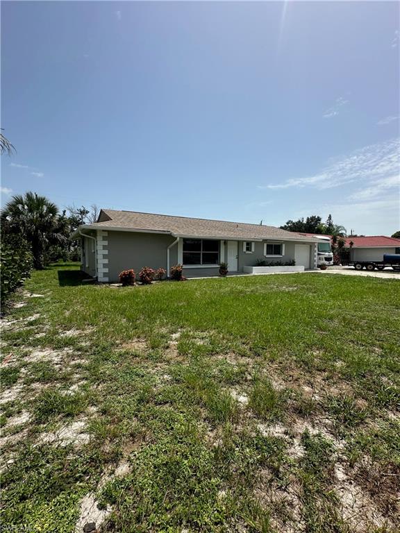 Welcome home to Beautiful 11150 Orangewood Dr...  Here's your chance to get in on the ground floor of Booming Bonita Springs!  What was talked about for years and years is finally in motion - a massive, walkable revitalization centered on Old 41 and the Imperial River, namely "Imperial 41" a major mixed-use development adding a kayak launch and approximately 19,000 square feet of commercial space for restaurants, shops, and offices, plus two public parks, a fire pit, restrooms and bike racks.  11150 Orangewood Dr is ideally located to capture all the growth and amazing revitalization happening in Bonita Springs.  This home is built like a tank with solid concrete block construction and stucco with a roof that was replaced in 2017, all brand new appliances were just installed July 2026 (including washer and dryer), HVAC system was serviced, cleaned and overhauled including a brand new coil, newly painted inside and out featuring an oversized lanai and showroom quality garage floor with epoxy and speckles.  Don't miss this one, the neighborhood is sooo cool, friendly neighbors that look out for each other and as a Bonus:  Per the deed, owners in the Orange Creek Subdivision hold an undivided 1/70th interest in the community boat ramp offering direct river access for kayaking, fishing, and peaceful river exploration!