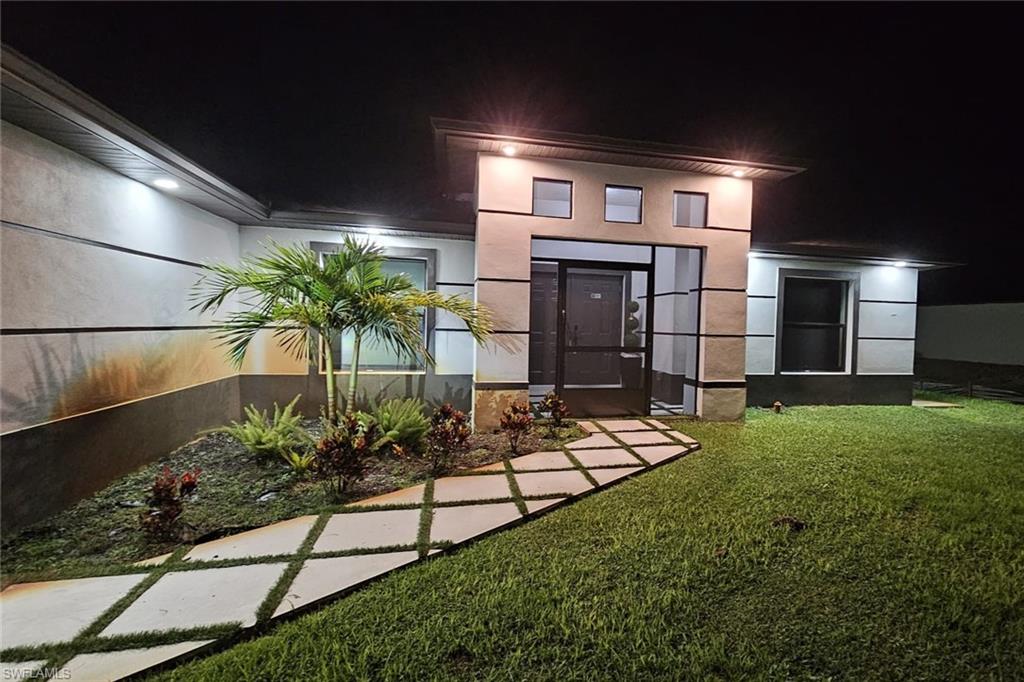 Experience luxury living in one of the most sought after areas of Lehigh Acres with this stunning, fully furnished 4 bedroom, 2 bathroom home situated on a spacious half acre lot. Designed for comfort, style, and convenience, this exceptional property offers a true resort style experience where all you need to do is arrive, walk through the front door, and feel at home.

Every detail has been thoughtfully curated with upscale furnishings, custom lighting, and elegant finishes throughout. The gourmet kitchen is a showpiece featuring stainless steel appliances, custom cabinetry, beautiful countertops with seating for four, a double wall oven, a built in wine rack, and a wine refrigerator, making it perfect for entertaining or everyday living.

The luxurious primary suite and additional bedrooms are complemented by custom closet systems and tasteful décor, while flat screen televisions are conveniently located throughout the home, including the screened lanai, so entertainment is always within reach.

Step outside and discover your own private outdoor retreat. The screened lanai provides the perfect place to relax, while the permanent fire pit, covered gazebo, and beautifully furnished outdoor living spaces create an ideal setting for gatherings with family and friends. The property also includes a dedicated children's play area and a game room that adds another level of enjoyment for residents and guests alike.

Whether you are relocating, looking for an executive rental, or searching for the perfect seasonal escape, this extraordinary home delivers luxury, comfort, and convenience in every detail.

Seasonal rental opportunities are available.

Schedule your private showing today and discover why this one of a kind luxury home is unlike anything else on the market.