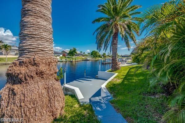 This is your " honey stop the car " moment, a 2000sq feet, Gulf access pool home at this price!!.
Add to that, this home is ready for you and all of the hard work has been done, updates and opulence galore, every element of the gourmet kitchen is brand new, the cabinets, quartz counters, appliances, lighting, all of it! 
Both bathrooms, including the plumbing are brand new, new tile flooring throughout, new light fixtures, a new electric fireplace and it's ready for you to claim it.
Step up, don't wait as deals don't get better than this.