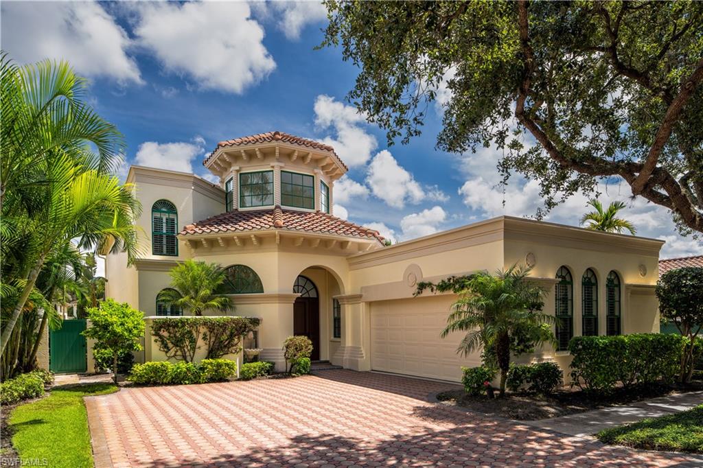 This charming and highly desirable Vizcaya Home  is located within the exclusive guard-gated  Bay Colony community.  Boasting a tranquil lake view, this two-story home has 4258 square feet of living area, 4 bedrooms, 4 full and one-half baths, making this home perfect for family gatherings and entertaining.  With an abundance of natural light, soaring ceilings, 1st floor master suite, private study, and chef's kitchen, this home is a must see!!   Beautifully lush and tropical landscaping surround the sparkling pool, spa and patio for tranquil and private relaxation.  A new roof was completed in 2018.  Bay Colony residents enjoy a luxury lifestyle with membership to the stunning and completely remodeled world class Bay Colony Beach, offering full beach service and private dining for members and their guests. Additionally, Bay Colony residents have full access to all of Pelican Bay's outstanding amenities.  Close to The Ritz Carlton, Waterside Shops, Artis Naples and a short drive to the renowned dining and dynamic night-life of downtown Naples.