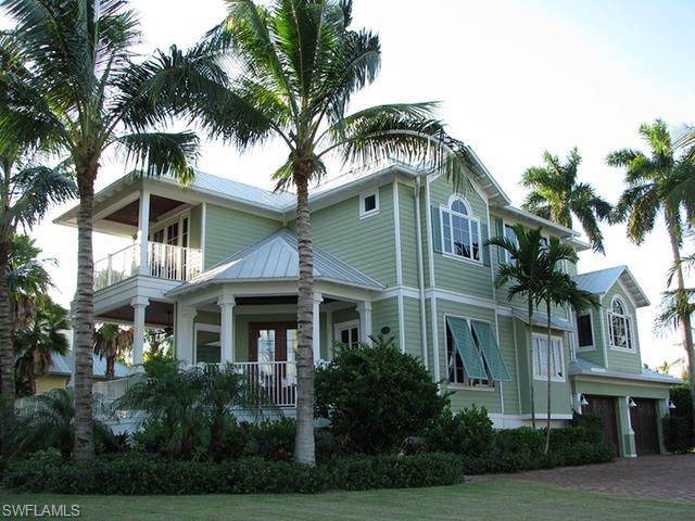 H.7540 - The Beach House.  Upscale Key West & Caribbean inspired decor. Furnished.  Only 300 steps to the Beach & Gulf.  Builder Mike Nourse, Weber Group Architects.  Residence over 8000 T. sq ft, 4 bdrms, 4 full & 1 half bath.  5 Decks.  Massive his n hers closets, mahogany floors, trim, & plantation shutters throughout.  Gourmet Chef's kitchen, stainless, granite, gas, 10 appliances.  Summer kitchen/grill for convenient, elegant poolside entertaining.  LR, DR, great room, media room, exec office off Master w/Wi-Fi & fax line.  3 bay tandem garage, Taylor elevator. HVAC control lighting system.  3 A/C zones, surround sound, poured cement construction.  6 flat screen 52-68" TV's, 2 laundry rms.  Famous Third Ave. shopping & dining plus Saturday morning Farmer's Market all a short stroll away. Last 12 months occasional income $144,000+.