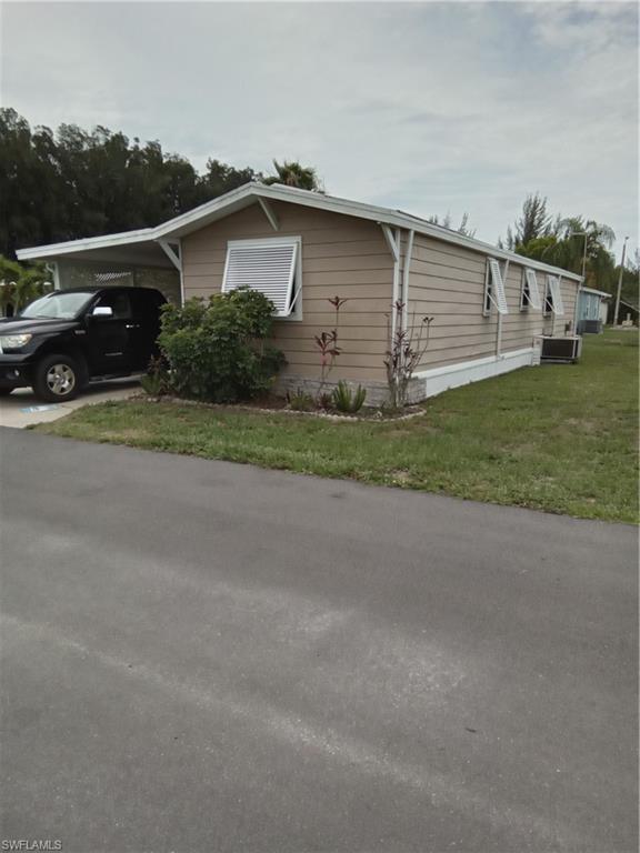 Ideal home for affordable island living! Desirable Pine Island Cove is a 55+ community with a fresh water canal system that offers Gulf access via the community boat ramp and lift. Imagine owning a home with Gulf access for under 200k today. Low monthly HOA fees with lots of activities and amenities. Home offers 2 covered carport areas, larger corner lot, new plantation style hurricane shutters, new solar shades on lanai, paved area for your golf cart, updated baths and flooring, washer/dryer and storage in enclosed shed and fully furnished including new leather sofa and lounge chair so you can move right in or use for an investment property. This lovely community is beautifully landscaped and also offers a parking area for additional vehicles or your boat. There is a one time HOA fee of $500.00 to new owner. Hurry! This one won't last!