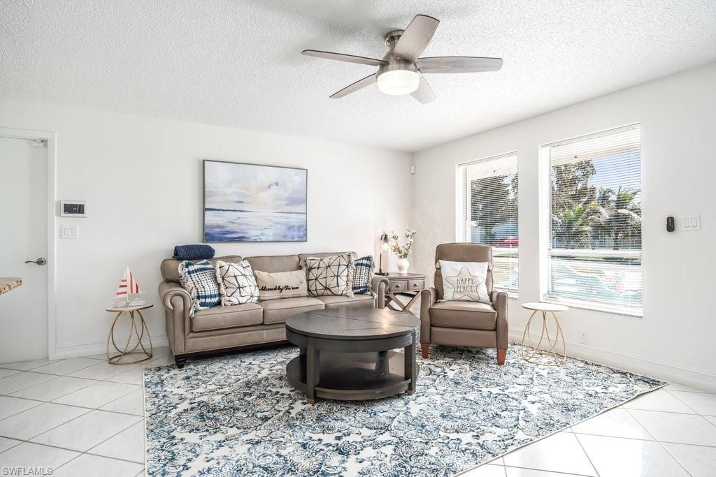 Great investment- investors take note! Just minutes from the beach, this beautifully updated Naples home combines an unbeatable location with modern upgrades throughout. Recent improvements include a 2021 roof, fresh interior paint, updated bathrooms, upgraded fans, refreshed grout, and attractive paver walkways and patio areas. The open-concept floor plan features granite countertops, wood cabinetry, and newer stainless steel appliances, creating a bright and inviting space that's ready to enjoy from day one. Step outside to a private, fully fenced backyard that's perfect for pets and offers plenty of room to add a custom pool. Located within the highly regarded Sea Gate Elementary, Pine Ridge Middle, and Naples High School districts, this home appeals to families seeking convenience, quality, and value. This property also presents an outstanding opportunity as a short-term rental, long-term rental, or seasonal retreat.