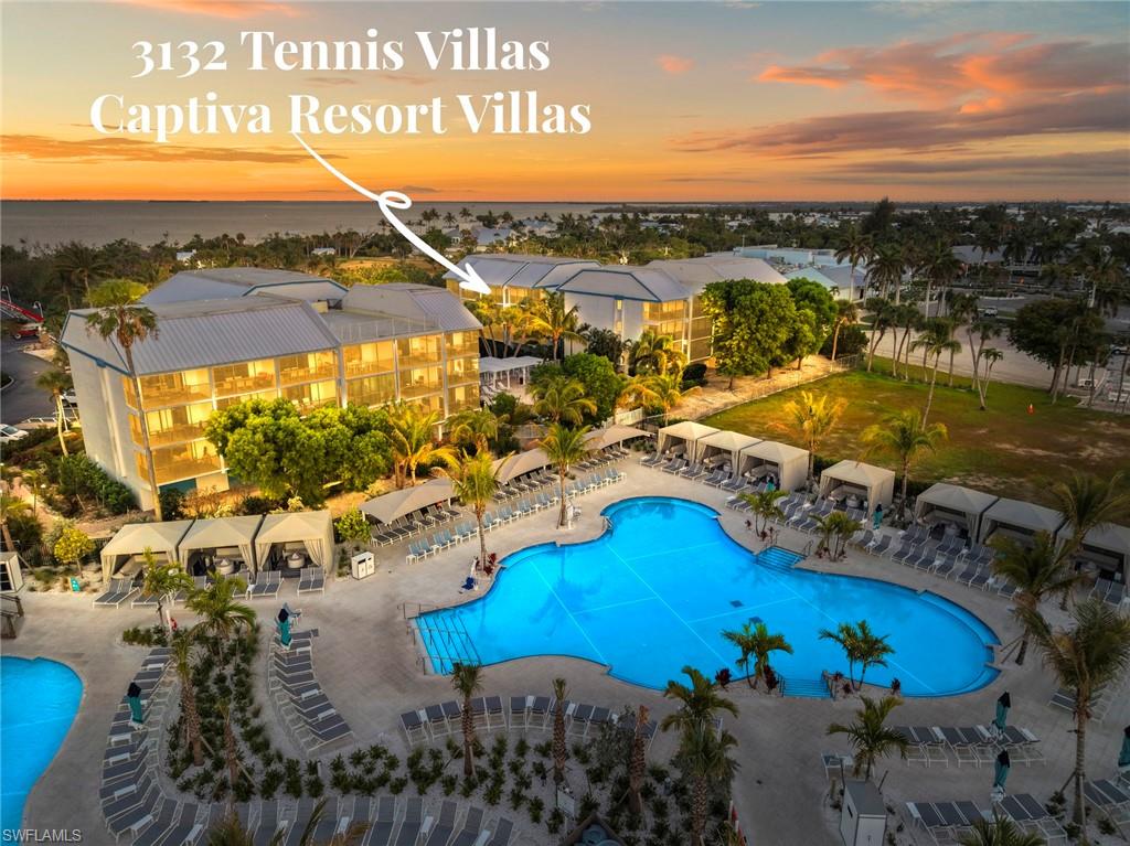 Imagine slipping away to Captiva and discovering the villa that redefines your idea of an island escape. Welcome to Captiva Resort Villas 3132—freshly renamed for 2025 and tucked behind the gates of South Seas Resort. This two-bedroom, two-bath, dual-level villa blends comfort with coastal charm in all the right ways. Step inside to bright, airy living with granite counters, impact sliders, ceilings tall enough to make your shoulders drop, and an extended lanai that adds extra room to lounge, dine, or simply daydream. Upstairs, a loft-style primary suite feels like an adults-only treehouse—private, calm, and made for slow mornings. The main level offers a sun-filled living area, guest bedroom, and full bath, all opening to peaceful courtyard views with prized northern exposure. Life here comes with easy perks: a sparkling pool, BBQ gathering spots, and elevators for convenience. Stroll to the Village of Captiva for boutiques, a morning Starbucks, or iconic island dining. Wander the other direction and you’re on the beach in minutes—perfect for those legendary Captiva sunsets.