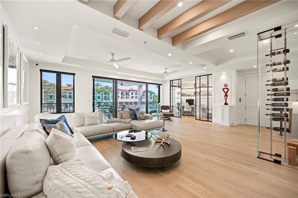 Experience elevated coastal living at Naples Bay Resort, where this extraordinary 3-bedroom plus office, 3.5 bath waterfront residence redefines luxury. This completely renovated home showcases a fresh, sophisticated design with every detail thoughtfully reimagined for modern elegance. Tucked inside one of Naples most coveted gated enclaves, this stunning townhouse captures sweeping marina and bay views from five private balconies, each one a front-row seat to glowing sunsets and gentle Gulf breezes.
Inside, refined elegance meets effortless comfort. Sunlight pours through floor-to-ceiling doors and windows, illuminating an expansive open layout adorned with updated designer finishes, custom millwork, and elevated architectural details throughout. The renovation introduced premium materials and contemporary touches, creating a seamless blend of style and functionality. The gourmet kitchen now shines as both a showpiece and workspace, featuring top-tier appliances, bespoke cabinetry, and sleek quartz countertops perfect for intimate dinners or vibrant entertaining.
A private elevator leads to the serene primary suite, a true sanctuary redesigned with a spa-inspired bath, oversized walk-in closets and its own balcony overlooking tranquil waters. The thoughtfully designed floor plan ensures exceptional privacy, with spacious guest suits each offering en-suite baths and private outdoor retreats. The versatile office adapts beautifully to your lifestyle.
Rare for resort living, this residence includes a spacious two-car garage and its own private elevator.
Ownership grants exclusive membership to the Naples Bay Club, unlocking a world of resort-caliber amenities: five sparkling pools and a lazy river, Har-Tru tennis courts with an on-site pro, a state-of-the-art fitness center, and direct Gulf access with on-site boat rentals. Savor waterfront dining at celebrated venues including Blackbird Modern Asian, Nosh on Naples Bay, BlueWater Bar & Grill, Café on the Bay, and the members-only Indulge Lounge.
Just moments away and within walking distance, the vibrant energy of Fifth Avenue South awaits with its upscale boutiques, fine dining, and entertainment, along with Naples iconic white-sand beaches.
This is more than a home, it’s a newly transformed waterfront retreat where every detail reflects timeless luxury and effortless coastal living.