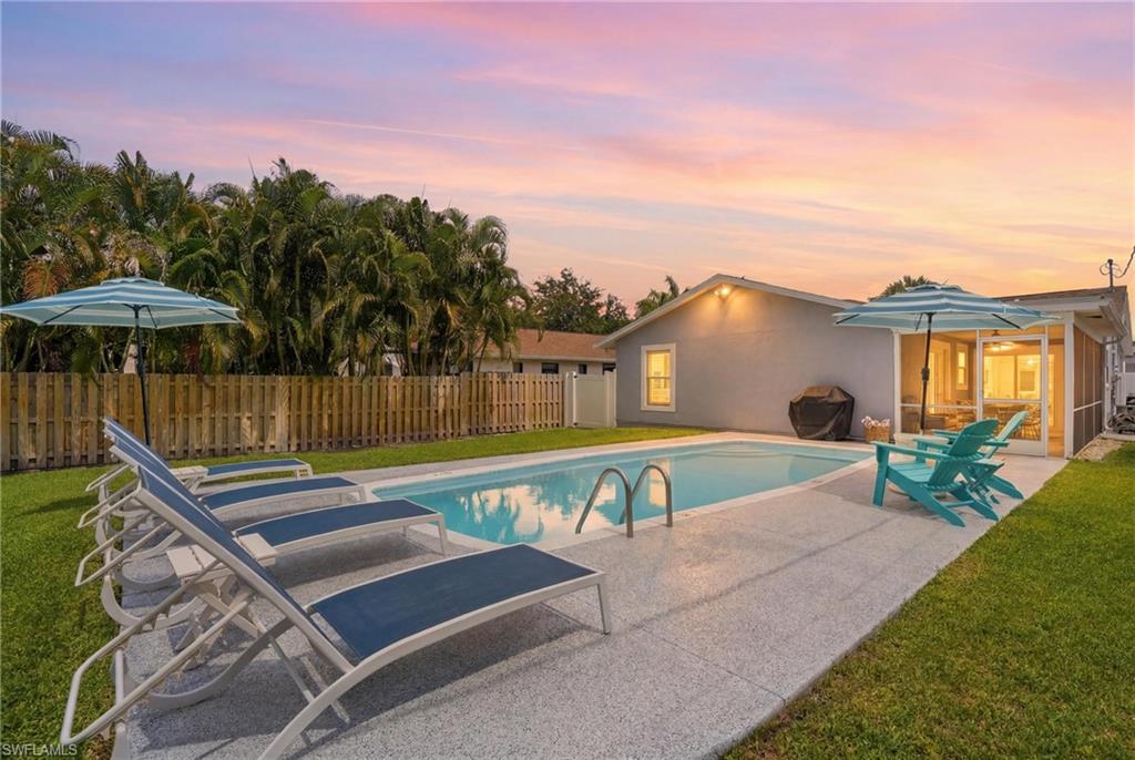 Experience the best of Naples coastal living in this beautifully updated three-
bedroom, two-bath residence, offering a private tropical retreat just minutes
from the beach. Designed for effortless indoor-outdoor living, the home centers around
a tranquil backyard oasis featuring a heated pool, lush tropical landscaping, and an
inviting setting ideal for relaxing or entertaining. Inside, a light-filled coastal aesthetic
is enhanced by designer beach-inspired furnishings and decor, elegant tile flooring
throughout (no carpet), and plantation shutters that add timeless style. Recent pool
upgrades include a new filter, and a freshly reglazed fiberglass finish,
ensuring years of enjoyment. Offered fully furnished, including pool and beach essentials,
this turnkey residence is ready to enjoy as a luxurious seasonal escape, full-time home,
or exceptional investment opportunity. With no HOA fees and an unbeatable location
just one mile from pristine Gulf beaches and Mercato's premier shopping, dining, and
entertainment, convenience is always within reach. The world-class boutiques, galleries,
and acclaimed restaurants of Fifth Avenue South in Old Naples are just a 10- to 15-minute
drive away. This is a rare opportunity to embrace the coveted Naples lifestyle in a
move-in-ready coastal retreat