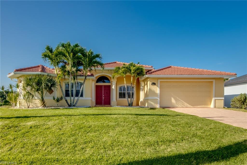 A dream-come-true custom Designer home on canal across from 9th hole fairway with breath-taking views of Coral Oaks Golf Course. Seller is original owner with builder's blueprints available. Fully furnished with expertly designed interior scheme! Featuring: Coffered ceilings with indirect lighting in Dining, Living and Master. Bahama Shutters, granite kitchen & bath countertops, master bath pass through shower with His & Hers closets & jetted tub. Bedrooms are completely furnished with King size bed in master & Queen size in both guest rooms. Electric fireplace for the cool January Florida night with French doors that open to a beautiful lanai area, large granite table & outdoor kitchen. Floors are bamboo, travertine, marble, wood. Fully furnished kitchen includes 2 sets of dishes & silverware, with wood cabinets, pantry and island with built-in wine cooler. Large paver sun deck connected to screened pool area with Infinity Edge pool, large Royal Palms in front, Coconut Palms in back, St Augustine lawn with automatic sprinkler system & more!
Matching paver driveway, walk, entrance, and lanai! Ready to live in, everything is included!
New Tile roof (long term investment & insurance discounts) & gutters June 2026, new pool pump 2026 & pool heater 2025, newer well pump & water pump, new fridge, new master bath faucets, new dishwasher! 
Schedule your showing today to see your future dream home!