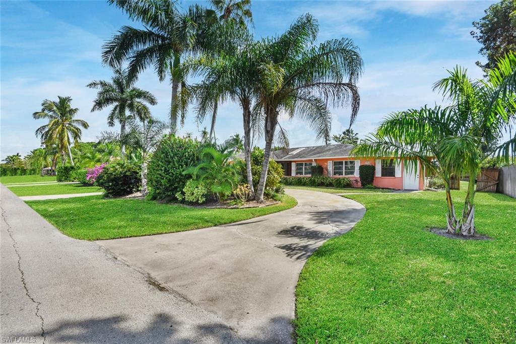 Investor Alert! Multifamily pool home on a double lot! Main unit is two bedroom two bathroom with a one car garage.  Second unit it one bedroom one bathroom. Tenant in place in second unit on a month to month basis. Both units have access to the oversized pool deck and 50' pool. The home has great curb appeal with a circular driveway. This property has many potential options, keep as investment, use one side as income potential or Guest Suite or combine both units to one larger home. Sold furnished ready for Seasonal Renters. Double lots in Naples park are hard to find. The yard is spacious and secluded being fully fenced. Just minutes to Vanderbilt Beach or Delnor-Wiggins State Park, Mercato, Whole Foods, Trader Joes and many other local attractions.