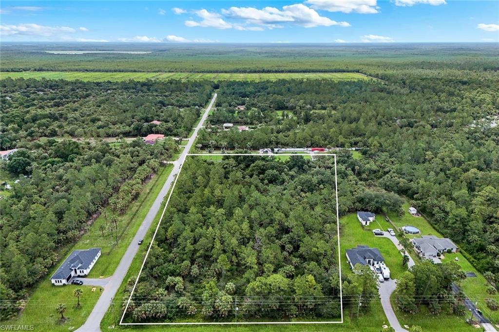 Discover a rare opportunity to own 5.15 acres in Golden Gate Estates with the potential to subdivide into two separate lots. Whether you're looking to create a private estate, family compound, or investment opportunity, this unique parcel offers flexibility and long-term potential in one of Naples' fastest-growing acreage communities.
Surrounded by natural Florida beauty and abundant wildlife, this property offers the privacy and tranquility that acreage buyers seek while remaining conveniently located near shopping, dining, schools, and everyday conveniences. Zoned Estates, the property allows for a primary residence and guest house, creating endless possibilities for custom estate living. An environmental study has already been completed and is available for review, providing valuable due diligence information to buyers and helping streamline the planning process. Buyers can explore a variety of development options while benefiting from having key environmental information readily available.