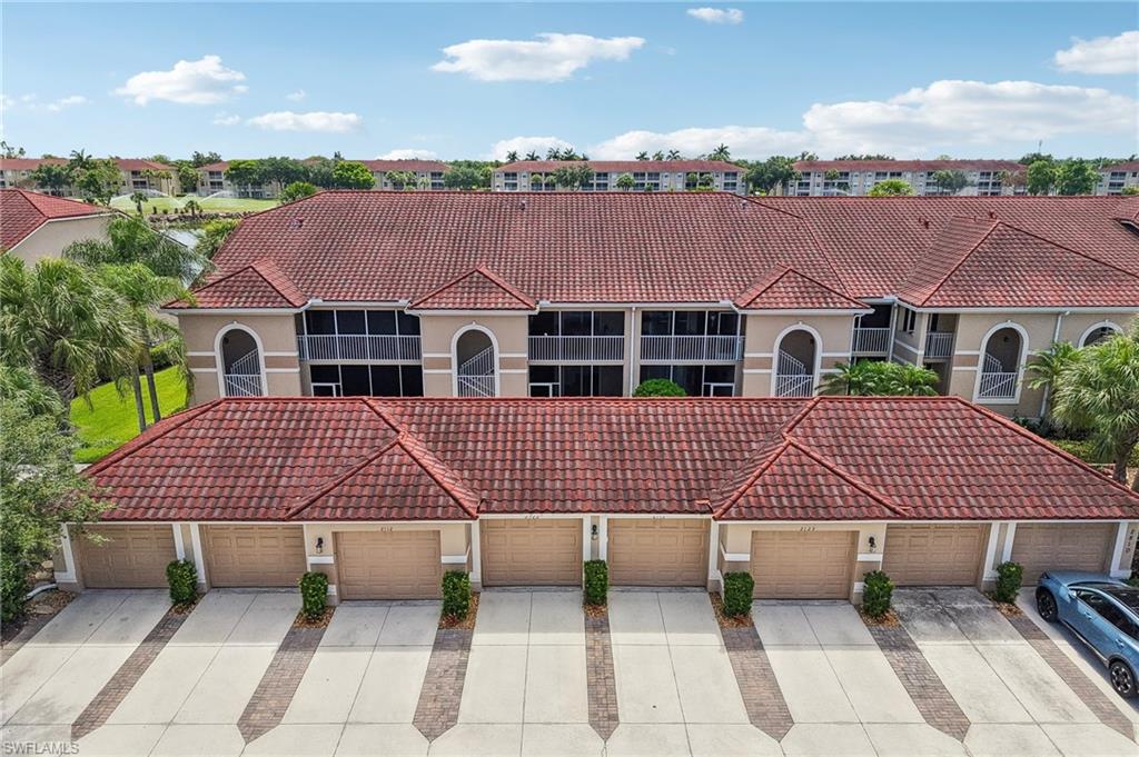 Located in the highly desirable Cypress Woods Golf & Country Club, this beautifully furnished first-floor condo at 2810 Cypress Trace Cir Unit 2112 offers 2 bedrooms plus a den, 2 bathrooms, and 1,414 square feet of light-filled living space with some of the best lake and golf course views in Cypress Trace. Designed in a coastal chic style, the residence features a spacious family room, eat-in kitchen, dining area, split-bedroom floor plan, and two screened lanais perfect for relaxing or entertaining while enjoying tranquil water views. The home also includes a detached one-car garage and bundled golf membership, providing access to an 18-hole Gordon Lewis-designed championship golf course, resort-style pool and spa, pickleball and bocce courts, fitness center, clubhouse dining, and an active social lifestyle within this gated North Naples community. Some photos are virtually staged.