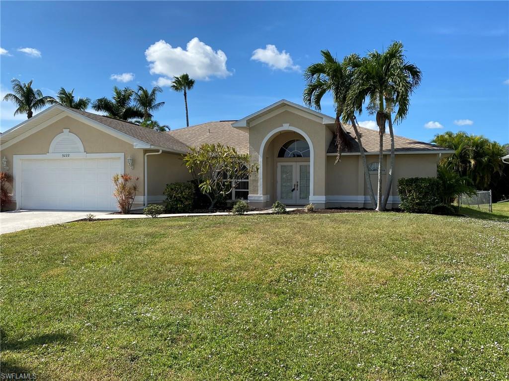 GREAT POOL HOME IN SW CAPE CORAL NEAR CAPE HARBOR! This 3/2/2 split floorplan home is light and bright and includes a huge, screened pool/lanai with plenty of room for entertaining, sunning or just relaxing on the extended pool deck. With pocket sliding glass doors opening onto the Lanai from the Living area, the 42' under truss Lanai gives extra outdoor living space so you can enjoy year-round "Paradise"! Featuring a spacious Kitchen with Breakfast nook overlooking the pool, a large pantry and interior laundry room, including Washer and Dryer. Vaulted ceilings and lots of windows give an open and spacious feel. Carpeting in the open Living/Dining area and the Master Bedroom. The Master Suite has a LARGE walk-in closet, tray ceiling and private sliding door entrance to Lanai/Pool.