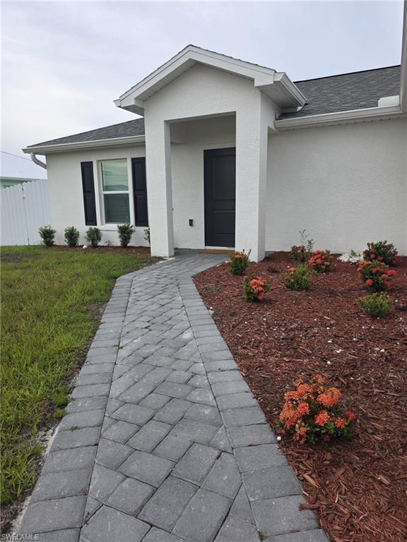 This beautifully designed 3-bedroom, 2-bathroom home combines modern style with everyday comfort. The open-concept floor plan features durable tile flooring throughout, elegant granite countertops, and a stylish kitchen equipped with stainless-steel appliances. The spacious primary suite offers a walk-in closet and a private en-suite bathroom, creating a comfortable retreat. Additional highlights include a walk-in pantry, impact-resistant windows, and a covered lanai overlooking a generous backyard—perfect for relaxing or entertaining. Conveniently located just minutes from parks, shopping, dining, and major commuter routes, this home offers the ideal blend of comfort, functionality, and convenience.