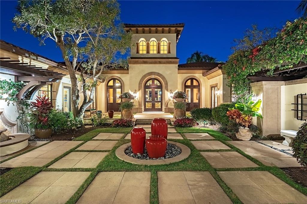 This magnificent custom golf estate resides on a picturesque .77 acre long range view lake to golf homesite in the exclusive Estuary at Grey Oaks neighborhood. The four bed plus study, four and a half bath great room plan home includes a custom kitchen with large island, Wolf and Sub-Zero appliances, intricate ceiling details throughout and neutral stone flooring in the main living areas. The luxurious outdoor living is perfect for entertaining and includes a spacious screened covered loggia with detailed cypress wood ceiling and automated storm shutters, gas fireplace and stand-alone summer kitchen and bar. Additional features include an elegant private courtyard entry, butler's pantry with side by side Sub-Zero wine coolers, side privacy garden and separate guest cabana. A world of luxury awaits you in Grey Oaks Country Club minutes from world-class shopping, beaches and dining.