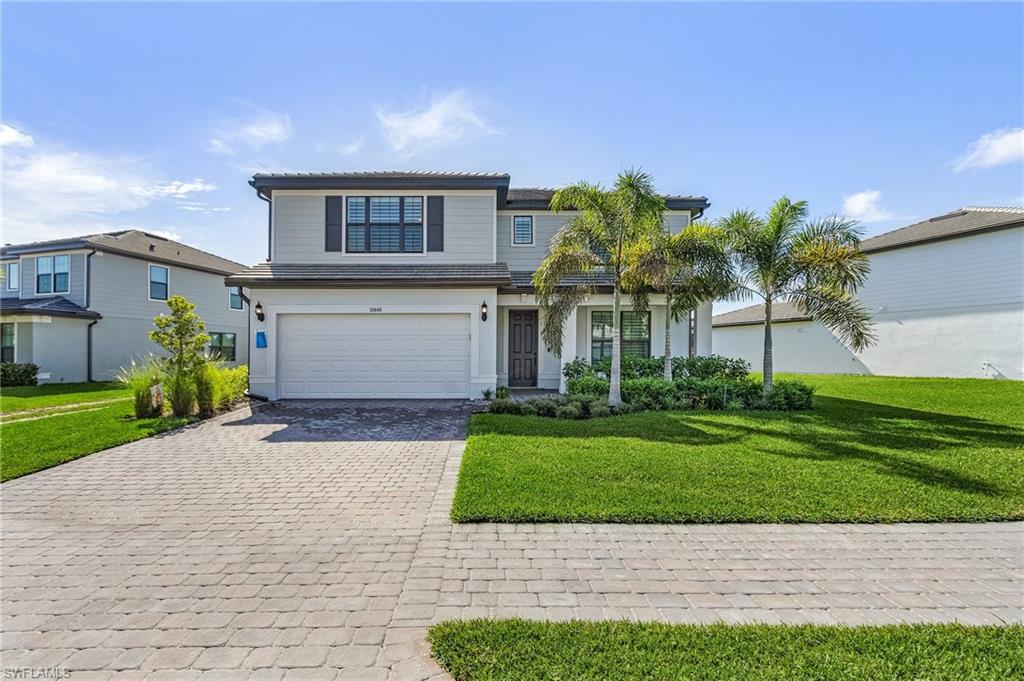 Experience luxury living in this beautifully designed newer construction home featuring 4 bedrooms plus a private den, 2.5 bathrooms, and a spacious open-concept floor plan perfect for everyday living and entertaining. The gourmet kitchen showcases upgraded stainless steel appliances, a natural gas range, and an oversized island that flows seamlessly into the great room.

Step outside to your private backyard oasis with tranquil lake views, a custom gas-heated pool and spa, covered lanai, and a grilling area pre-plumbed for a future outdoor kitchen—ready for the next owner to create their ideal outdoor living space.

Additional highlights include a spacious upstairs loft, impact-resistant windows and doors, an extended 4-foot garage providing extra storage and workspace, and a well-appointed laundry room with built-in cabinetry and a utility sink.

Ideally located just minutes from I-75, shopping, dining, golf, and Naples' renowned beaches, this exceptional home also offers access to community amenities, including a pool and cabana. Move-in ready and designed to enjoy the very best of the Southwest Florida lifestyle.