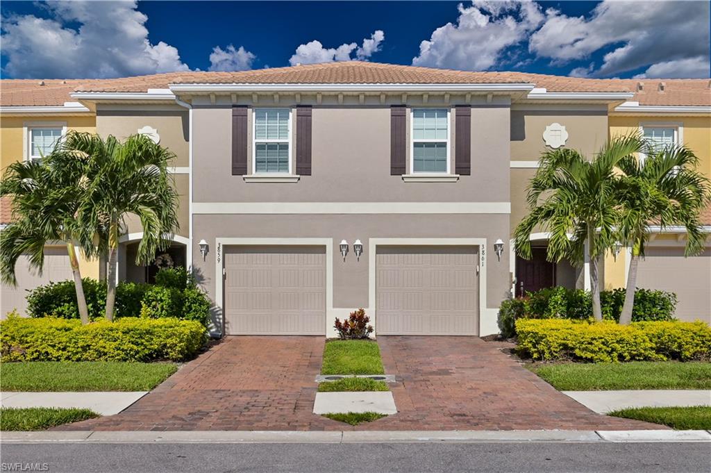 Look at this GORGEOUS townhome with an incredible Lake view.  This 1635 sq. ft. home has TWO MASTER SUITES with a large laundry room upstairs and an open floor plan kitchen/living/dining room  and a half bath on the first floor. This beautiful home has the UPGRADED appliance package (worth over $6000), PLANTATION SHUTTERS, and tile throughout the first floor.  Lindsford is a gated community offering the LOWEST HOA's in town ($138 a month) and a spectacular community pool.  There are sidewalks throughout for walking your furry friend and pet stations located around the neighborhood.  This community is close to all your shopping needs, a short 12 mile drive to RSW Airport and a quick jaunt to the beaches.  Hurry, these units don't last long, so call for your personal tour NOW!!!