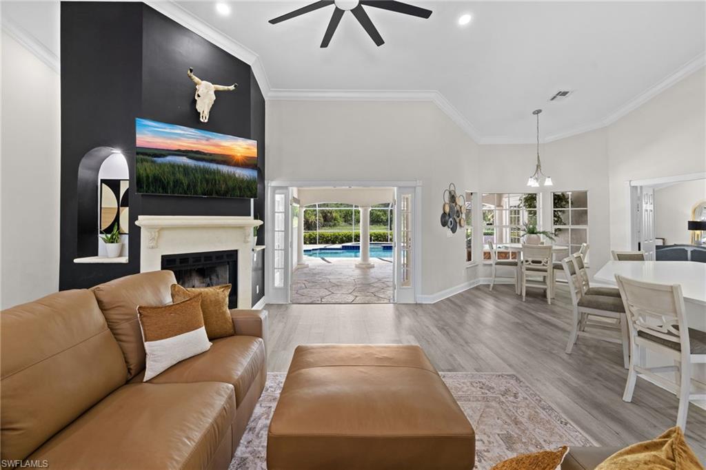 Welcome to your own private Naples retreat on 2.73 fully fenced acres behind a gated entrance—where no HOA means you can truly live without limits. Offered fully furnished, this move-in-ready estate features 4 bedrooms + den, 3 baths, an open, light-filled floor plan, a detached 1-car garage, and a resort-style pool and spa built for entertaining. Opportunities like this don't come along often - the perfect combination of privacy, space, and the freedom to truly enjoy the Florida lifestyle.

Being sold furnished, this home is ready for you to move in and start living from day one. The updated kitchen is designed for gathering, featuring a breakfast bar and a sunny breakfast nook overlooking the sparkling pool and lanai—perfect for morning coffee or casual meals. The kitchen flows seamlessly into the large, open living room/dining room area allowing for flexibility, while the separate family room provides another inviting space to relax or entertain.

The spacious owner's suite is your own private retreat, complete with sliding glass doors to the lanai, a large walk-in closet, and a spa-inspired bath featuring dual vanities, a soaking tub, and a separate walk-in shower. Guests will appreciate their own private accommodations as well, with one guest suite offering an en-suite bath and direct lanai access through sliding glass doors. Two additional guest bedrooms share the third full bath, creating a layout that's ideal for family and visitors alike.

Step outside and discover your own backyard paradise. The screened-in pool and spa invite you to relax year-round, while the covered lanai with an outdoor TV creates the perfect setting for watching the big game, hosting family and friends, or simply unwinding after a long day.

The home was re-roofed in 2017, providing added peace of mind.

With no HOA, you have the freedom to bring your RV, boat, trailers, work vehicles, or car collection, operate a home-based business, or expand the property with a guest house, workshop, or additional garage.

If you've been searching for a property that offers privacy, acreage, a pool, furnished convenience, and unlimited potential—all just minutes from Naples shopping, dining, and world-famous Gulf beaches—this is the one.

Rarely does a property with this much land, flexibility, and value become available. Schedule your private showing today before this exceptional Naples estate is gone!