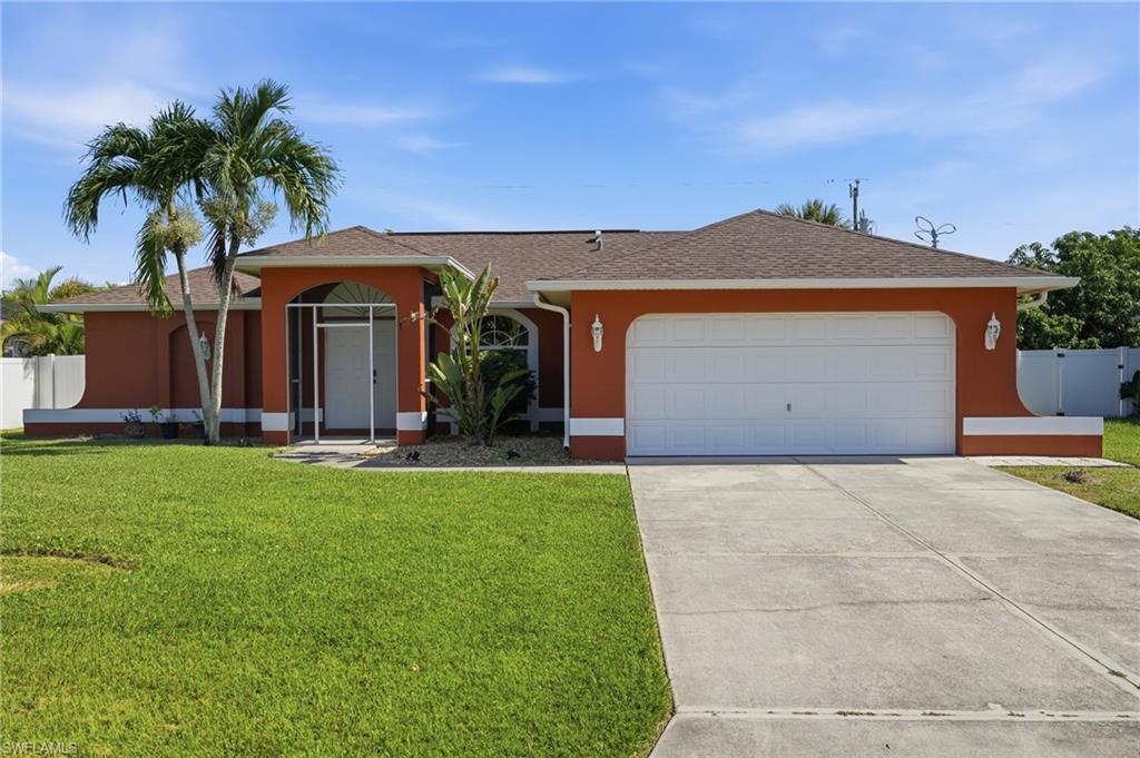 Welcome to this beautiful Florida home located in the thriving Northeast Cape Coral area! Offering 3 bedrooms, 2 full bathrooms, and 1,205 square feet of living space, this unique floor plan feels much larger thanks to its thoughtful design and spacious layout. The split-bedroom floor plan provides exceptional privacy, with the primary suite situated on one side of the home and the guest bedrooms on the opposite side. 

The open-concept living area features vaulted ceilings and flows seamlessly into the kitchen, creating a bright and inviting space for everyday living and entertaining. Tile flooring throughout the main living areas adds easy maintenance. The fully fenced backyard provides additional privacy. NO HOAs and NO FLOOD ZONE here. Home is conveniently located close to schools, parks, entertainment, shopping and less than 10 minutes to downtown Cape Coral. Ready to see it for yourself? Call your agent today and setup that appointment.