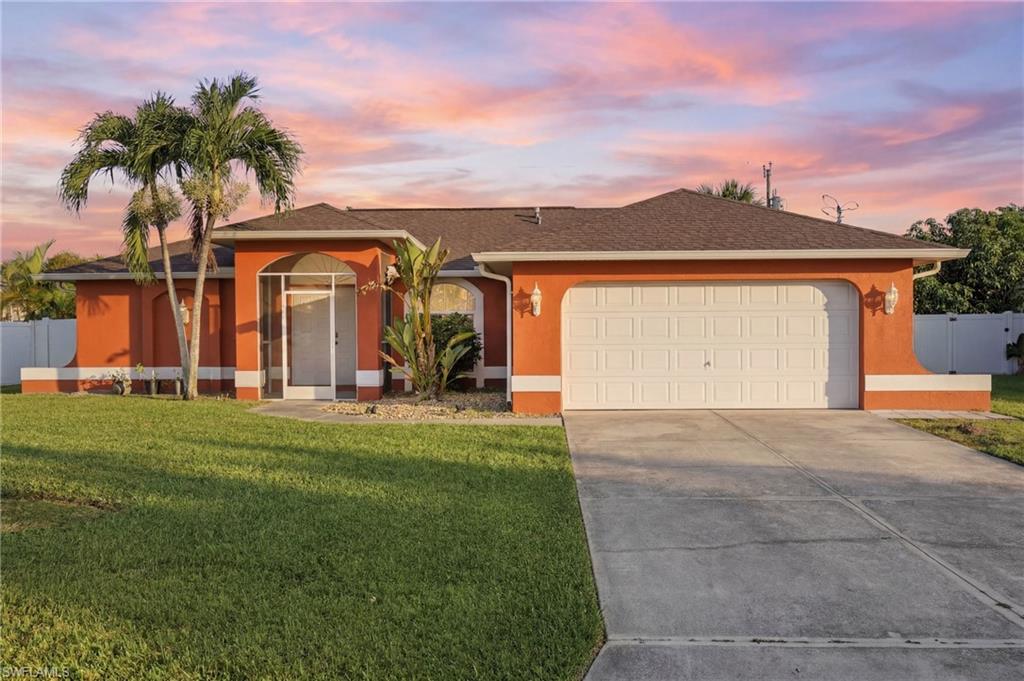 Welcome to this beautiful Florida home located in the thriving Northeast Cape Coral area! Offering 3 bedrooms, 2 full bathrooms, and 1,205 square feet of living space, this unique floor plan feels much larger thanks to its thoughtful design and spacious layout. The split-bedroom floor plan provides exceptional privacy, with the primary suite situated on one side of the home and the guest bedrooms on the opposite side. 

The open-concept living area features vaulted ceilings and flows seamlessly into the kitchen, creating a bright and inviting space for everyday living and entertaining. Tile flooring throughout the main living areas adds easy maintenance. The fully fenced backyard provides additional privacy. NO HOAs and NO FLOOD ZONE here. Home is conveniently located close to schools, parks, entertainment, shopping and less than 10 minutes to downtown Cape Coral. Ready to see it for yourself? Call your agent today and setup that appointment.