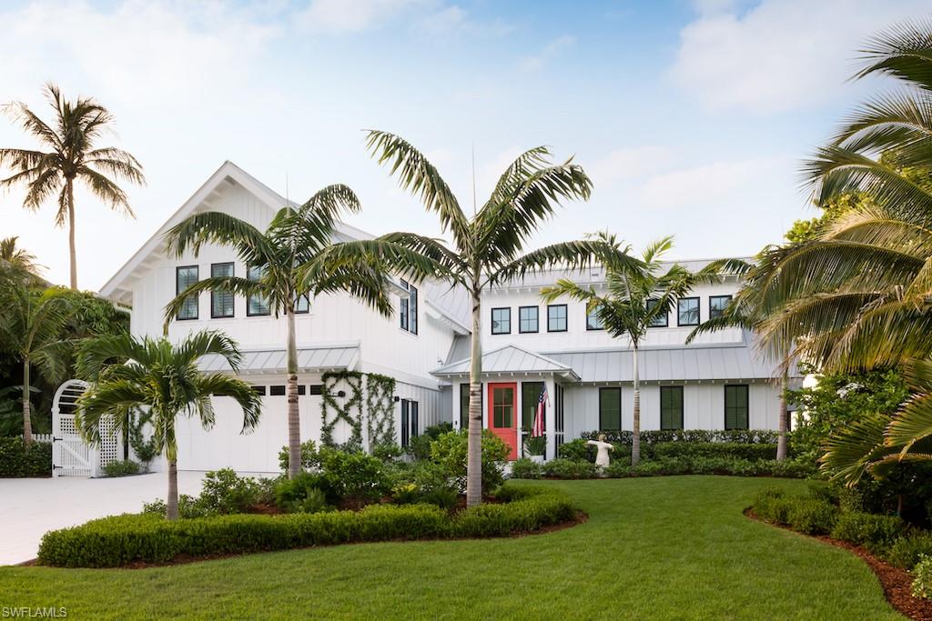 Diamond on the bay! Reinvented and expanded in 2019 this gorgeous beauty embodies a blend of contemporary coastal influences and classic cottage charm. The architectural details are impressive. From the espaliers, to the board and batten siding with a cottage accent roof and historically accurate corbels, this home is exceptional. Inside, the walls are adorned with shiplap and gorgeous wide plank oak spans the floor. The ceiling soars and bring in beautiful light with reflections from the bay. The primary suite is on the first level with the guest suites above. No damage to the upper level. The price on the home reflects a completion of the restoration to the first level. Featured on the cover of Lux magazine and showcased in Gulfshore life.This completion is anticipated for April/May 2023. One of a kind!