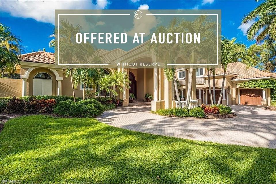 No Reserve Auction to be held on-site, Saturday, March 28th, 2020, at 11:00 AM.   Grey Oaks, a name which is synonymous with luxury lifestyle. Remastered by Clive Daniel home this southern exposure golf course estate offers privacy and is welcoming the moment you walk through the door. With a beautiful lagoon pool and lanai encompassing over 2000 sq feet of outdoor living, entertaining or simply relaxing with family on the 7th hole of the Pine Course, tranquility abounds. There are three bedrooms on the ground floor,  a master bedroom bathroom and large walk in closets, a second guest master with ensuite with private pool access and a third bedroom and bathroom. The fourth bedroom is a full guest suite offering  elevated bedroom floor with a half level of separate living space and full bath all of which paves the way for the perfect in law/guest suite. Pull into one of three separate garage doors or pull under your private porte-cochere from your circular driveway.