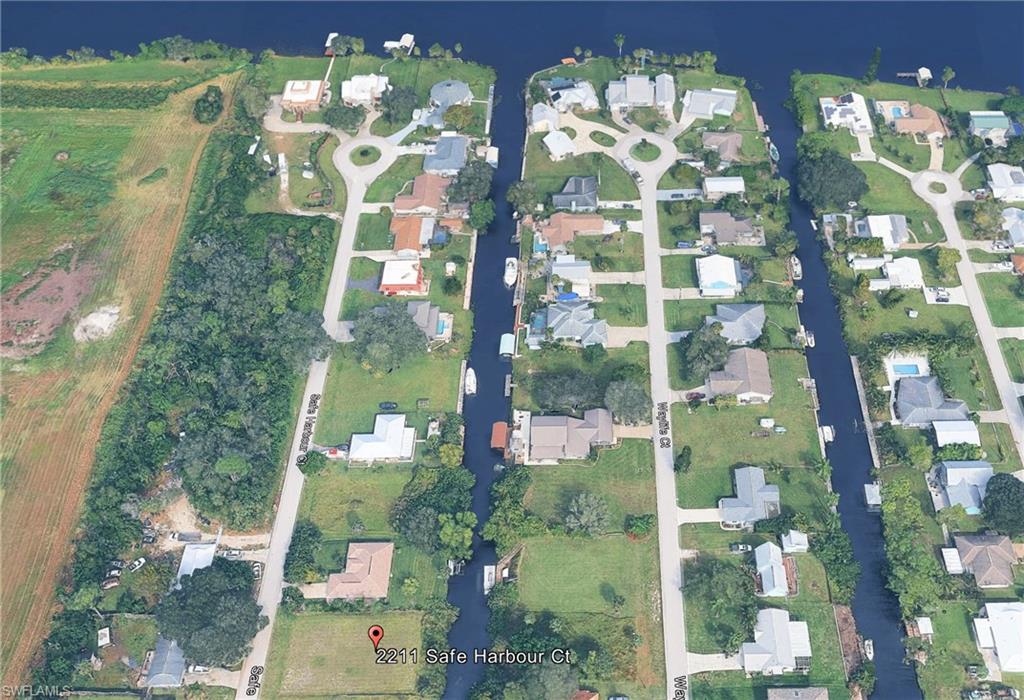 Prime Direct-Access Waterfront Lot – Build Your Dream Home on the Water! Discover this exceptional 0.24-acre (approximately 10,280 sq ft) vacant waterfront parcel in the serene River Oaks subdivision of Alva, Florida. Offering direct, no-bridge access to the Caloosahatchee River and ultimately the Gulf of Mexico, this cleared lot is perfectly positioned for boating enthusiasts, fishermen, and those seeking a peaceful waterfront lifestyle. Just a quick 2-minute boat ride puts you out on the wide-open Caloosahatchee River near Alva Center—ideal for effortless access to world-class fishing, cruising, and waterfront adventures. The property sits on a protected canal, providing calm waters right at your dock while keeping you close to the river's main flow.