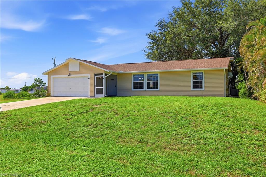 NW Cape Coral remains one of the strongest appreciation corridors in the city, and this home sits directly in the path of growth. It delivers the clean, move-in-ready feel buyers want, with major updates already completed for comfort, efficiency, and long-term peace of mind. 
Inside, the open-concept living area with tile flooring creates a bright, connected space perfect for everyday living. The kitchen features white cabinets, granite countertops, and a large breakfast bar, offering plenty of room for cooking, entertaining, or casual dining. The primary bedroom includes a walk-in closet, and natural light flows throughout the home, giving every room a fresh, welcoming feel. On the opposite side of the home, two additional bedrooms and a shared guest bathroom provide privacy and convenience for family, guests, or seasonal visitors.
This property has received significant upgrades, including:  City water and sewer installed in 2022 (assessment paid); Roof replaced in 2022; Brand-new gutters installed in 2025 with leaf guard on the back gutter; Water heater replaced in 2024.
Outdoor living is just as impressive. The 5-foot chain-link fence encloses the backyard — ideal for pets, privacy, and security. The paved concrete driveway leads to an attached 2-car garage, and the spacious backyard offers ample room to build an in-ground pool, giving buyers endless future possibilities. Families will appreciate the flexibility of school choice options available in this area.
Located in Flood Zone X, this home requires no mandatory flood insurance, adding affordability and long-term value.
Whether you’re a first-time homebuyer, investor, or Airbnb host, this property offers beauty, convenience, and opportunity in one of Cape Coral’s most desirable and fast-growing neighborhoods.