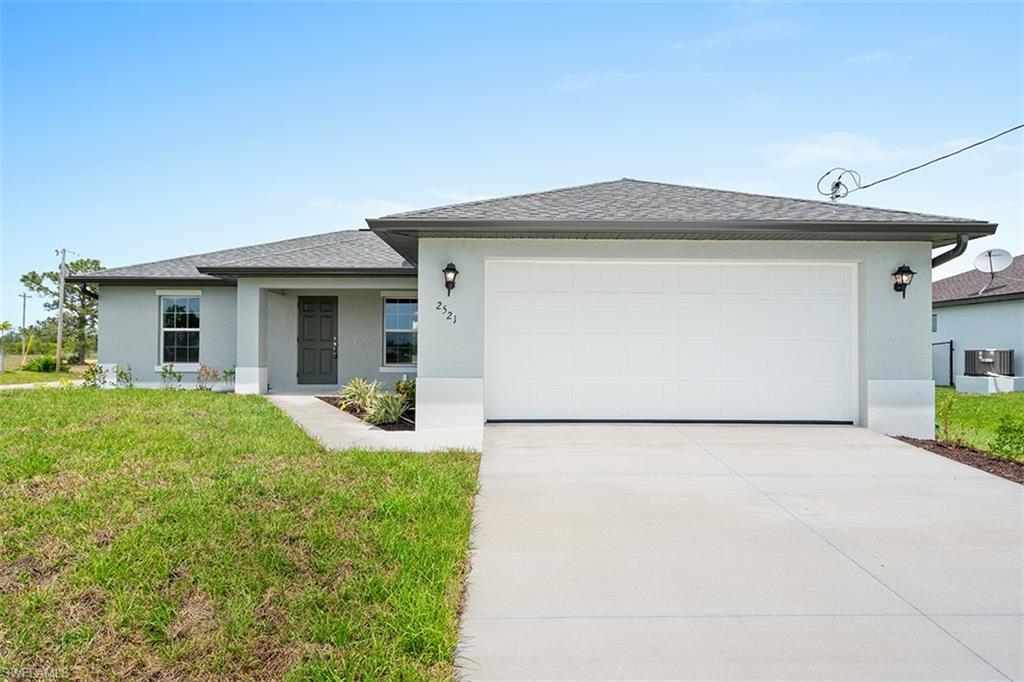 New construction!! Come see this Sanibel floorplan in the Signature Series. Beautiful 3 bedroom home in North Cape Coral. Home includes a full 1 year warranty and a 10 yr structural warranty. Open floor plan with cathedral ceilings and center island kitchen. Spacious living room leads to large covered lanai so you can enjoy the SW Florida lifestyle! Features include: Concrete Block Construction and Interior Wood Framing, Under truss lanai, Lenox 14 Seer high efficiency AC system, Moen plumbing fixtures, Dimensional Shingles, PGT Low E Insulated windows, 30” upper cabinets, stainless steel kitchen appliance package, irrigation system, water treatment system, 18" tile in kitchen and baths, walk in shower in master bath. Pictures shown are of a completed home and features may differ. You will not find another new construction home at this price with this quality of construction. Ask sales representative about closing cost incentives.