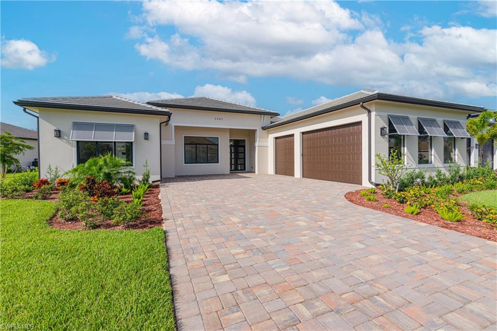 MOVE IN TOMORROW! - NEW CONSTRUCTION. Welcome to luxury living in River Hall Country Club. This brand-new custom estate offers 3,577 SF UNDER AIR (5,333 SF TOTAL) with 3 SPACIOUS BEDROOMS, DEDICATED OFFICE, 3 FULL BATHS, 2 HALF BATHS, AND A 3-CAR GARAGE, all set on an OVERSIZED ESTATE LOT WITH SWEEPING GOLF COURSE VIEWS.

Step inside to an impressive OPEN-CONCEPT LAYOUT with soaring CEILINGS OVER 12 FEET HIGH (UP TO 15’ IN SELECT AREAS) and elegant finishes throughout. Enjoy OVERSIZED PORCELAIN – WOOD LOOK – TILE FLOORING, MULTI-TIERED TRAY CEILINGS, and 10-FOOT SLIDING GLASS DOORS that seamlessly blend indoor and outdoor living. Impact-rated windows and doors, a modern electric fireplace, designer wallpaper, custom cabinetry, and a statement TV accent wall complete the sophisticated interior design.

The CHEF’S KITCHEN is fully outfitted with BOSCH APPLIANCES, a FULL-SIZE WINE REFRIGERATOR, QUARTZ WATERFALL COUNTERTOPS, and a WALK-UP WET BAR AND COFFEE STATION with designer tile accents—perfect for entertaining.

Retreat to the luxurious owner’s suite, featuring an OVERSIZED FRAMELESS GLASS SHOWER (including rainfall, fixed, and body sprayer), a freestanding soaking tub, and dual vanities.

Enjoy Florida living year-round on the SCREEN-ENCLOSED LANAI with PANORAMIC VIEWS, a POOL AND SPA, and a FULLY EQUIPPED OUTDOOR KITCHEN.

River Hall Country Club is home to a CHAMPIONSHIP 18-HOLE COURSE designed by Davis Love III and offers RESORT-STYLE AMENITIES with NO EQUITY MEMBERSHIP, NO INITIATION FEES, AND NO FOOD MINIMUMS. Community features include:

• Golf Clubhouse & Grille
• Lakeside pool and tiki bar restaurant
• Lagoon-style resort pool
• Full fitness center
• Tennis & pickleball courts
• In-community elementary school
• On-site fire station

Centrally located near I-75, RSW AIRPORT, AND DOWNTOWN FORT MYERS, this stunning home combines elegance, convenience, and lifestyle in one exceptional offering.

NOTE: HOME HAS BEEN VIRTUALLY STAGED FOR ILLUSTRATIVE PURPOSES.