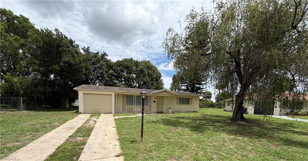 Charming 2 bedroom, 1 bathroom home with a 1 car garage featuring beautiful terrazzo flooring throughout. Enjoy the additional Florida room, perfect for extra living space, a home office, or relaxing area. Conveniently located within walking distance to shopping, schools, and public transportation. Great central location with easy access to everyday conveniences.