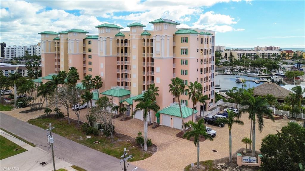 Coastal Elegance at The Palm Harbor Club! Captivating Views in this Exclusive Waterfront Residence. Capture the Wide Water Views on the Intersecting Canal of the Marina Inlet from your 5th Floor Residence. Start your day on Your Private Lanai while sipping morning coffee; watch the boats pass as they head out for the days catch, the Dolphins are so close; you can almost reach out & touch them! This Residence is waiting for you! Palm Harbor is just Steps Away from the White Sandy Beaches & Blue Green Waters of the Gulf of Mexico. Stroll along the beach while the Dolphins Play along the water's edge; maybe take in tennis, swim, soak in the hot tub or just relax poolside with your favorite book. Later in the day... take a stroll on the beach, watching the Sunset Colors light the evening sky. Bring Your Coastal Design Ideas to Life... just a few simple changes and you have found your Perfect Slice of Paradise!