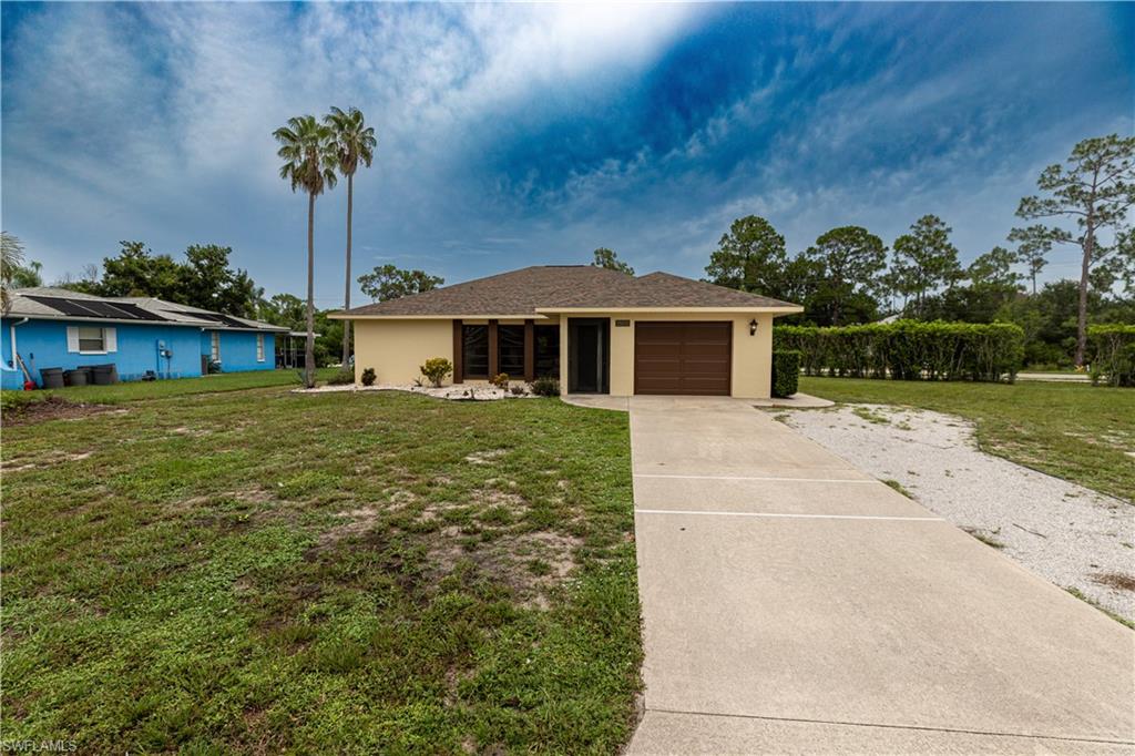 Welcome to this rarely available, beautiful single-family home which sits on a corner lot in the heart of Bonita Springs! Featuring nearly 1,500 square feet of thoughtfully designed living space, this 3-bedroom, 2-bathroom home captures your attention immediately with its curb appeal and mature landscaping. The interior is defined by custom upgrades, including tile flooring throughout (no carpet!), spacious bathrooms, and a modern kitchen complete with granite countertops and a beautiful backsplash. The breakfast bar overlooks an expansive living area that opens directly onto a very large screened-in lanai, offering an exceptional flow for entertaining and family gatherings. NO HOA, NO CDD and NO Flood Zone! Perfectly situated for convenience, this property places you moments away from Gulf beaches, fine dining/entertainment, I-75, SWFL Airport, and prime shopping at Coconut Point, The Promenade, and Miromar Outlets.