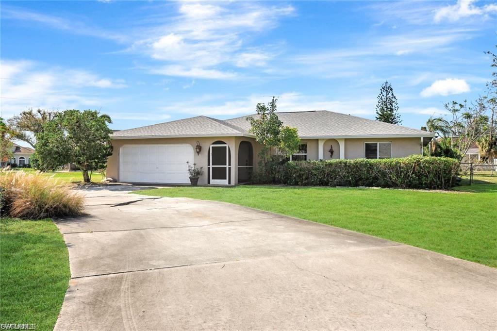 Beautiful Pool Home on an Oversized Corner Lot – Assessments Paid!
Welcome to this well-maintained 3-bedroom, 2-bathroom pool home situated on an oversized corner lot in one of Cape Coral's most desirable neighborhoods. Featuring 1,458 square feet of living space, this home offers an open split-bedroom floor plan with tile flooring throughout, creating a bright and functional layout perfect for everyday living and entertaining.
The updated kitchen features custom cabinetry, granite countertops, and stainless steel appliances, while both bathrooms have been tastefully remodeled. Step outside to your screened lanai and enjoy the private pool, fully fenced backyard, mature landscaping, an ideal setting for relaxing or entertaining family and friends.
Recent improvements include a new roof (2024) and A/C replaced in 2019, providing added value and peace of mind. Additional highlights include a circular driveway, oversized 2-car garage, and a spacious oversized corner lot. Best of all, the property is NOT located in a flood zone, and all city water and sewer assessments have been paid.
Conveniently located near schools, shopping, dining, parks, and with easy access to Fort Myers, this home is an excellent opportunity as a primary residence, seasonal retreat, or investment property.
Don't miss this incredible opportunity.