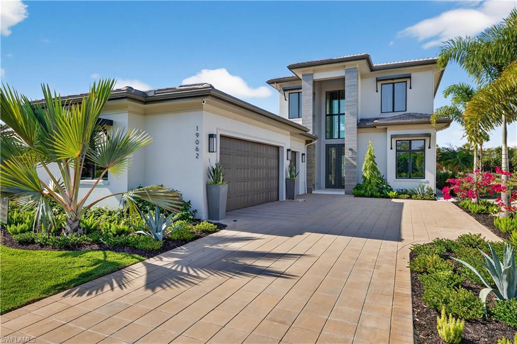 No more waiting! Take a tour today- Nestled within the esteemed Messina Neighborhood at Miromar Lakes, The Castello is a true testament to luxurious golfside living. Built by Harwick Homes, this masterpiece has been meticulously designed to merge contemporary sophistication with the serene beauty of its natural surroundings. Spanning 3,667 square feet of air-conditioned living space, The Castello’s open floorplan design offers 3 bedrooms and 3½ baths plus a private den/office across two stunning stories. - Interior Elegance The state-of-the-art kitchen is a chef's dream, featuring Wolf and Sub-Zero appliance package with a French-door refrigerator, combination speed oven, natural gas cooktop, and dishwasher. Quartz countertops paired with natural stone finishes for a nature-inspired aesthetic. Newport Brass® pull-out faucet and a Franke undermount single bowl sink. A spacious butler's pantry with custom built-ins. The owner’s suite is a private haven, offering: Double vanities with quartz countertops. A freestanding soaker tub and Kohler and Newport Brass plumbing fixtures. Two expansive walk-in closets, each with custom-designed closet systems. Intricately designed decorative tile details. Outdoor Living Masterpiece Step into a private oasis designed by Harwick Homes, featuring: An outdoor kitchen with a 36-inch Alfresco stainless-steel grill, undercounter refrigerator, and stone countertops. Stained tongue-and-groove wood ceilings in the lanai, complemented by motorized roll-down shutters and screens for effortless comfort and protection. A resort-style pool and spa with a sun shelf, elegant water features, and a matching paver pool deck. Professionally designed landscape planting and lighting that enhance the property’s ambiance. Architectural Sophistication the Castello’s modern stucco façade is accentuated with designer accents and ornamental shutters. Custom-designed hurricane impact-rated doors and windows ensure safety without compromising style. Inside, the home is beautifully curated by the Collins DuPont Design Group, showcasing decorative ceilings, luxury finishes, and a seamless blend of form and function. Furniture package is available. Experience a lifestyle of relaxation and grandeur, all within the coveted Messina Neighborhood at Miromar Lakes.