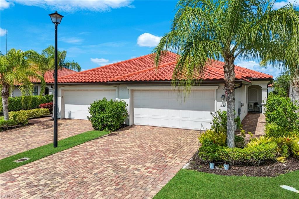 Experience the ease of Southwest Florida living in this move in ready, beautifully maintained first floor ranch residence located within the gated community of Artesia. Offering two bedrooms plus a versatile den, two full baths, a spacious open concept floor plan, full laundry room, attached two car garage and fresh, neutral décor throughout, this inviting home is ideal as a full time residence, seasonal retreat or investment opportunity. Unwind on the screened lanai overlooking a peaceful setting, then enjoy Artesia's exceptional resort style amenities including a stunning clubhouse, beach entry pool, fitness center, theater, pickleball, bocce, dog parks, walking and biking paths. Ideally located close to downtown Naples, Marco Island, world class beaches, golf, dining and shopping, this home offers the perfect blend of comfort, convenience and the coastal lifestyle that makes Naples one of Southwest Florida's most desirable destinations.